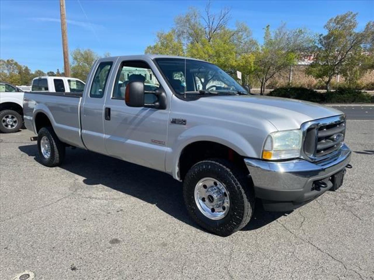2004 Silver Clearcoat Metallic Ford F-350 Super Duty XLT (1FTSX31P84E) with an Power Stroke 6.0L Diesel Turbo V8 325hp 560ft. lbs. Other engine, 5-Speed Automatic transmission, located at 800 Riverside Ave, Roseville, CA, 95678, 916-773-4549 & Toll Free: 866-719-4393, 38.732265, -121.291039 - DIESEL SUPER CAB 4X4 FX4 XLT 91K MILES SERVICE RECORDS ONE OWNER CLEAN CARFAX - Photo#1