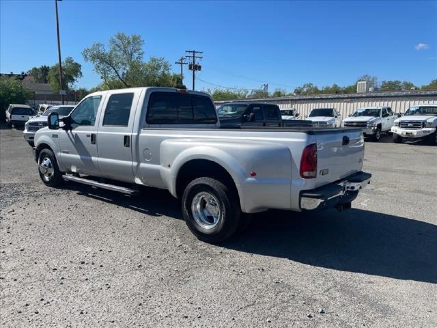 2004 Silver Clearcoat Metallic Ford F-350 Super Duty XLT (1FTWW32P24E) with an Power Stroke 6.0L Diesel Turbo V8 325hp 560ft. lbs. Other engine, 5-Speed Automatic transmission, located at 800 Riverside Ave, Roseville, CA, 95678, 916-773-4549 & Toll Free: 866-719-4393, 38.732265, -121.291039 - DIESEL CREW CAB DUALLY XLT LOW MILES MOON ROOF NEW TIRES NEW HIGH PRESSURE OIL PUMP NEW EGR AND OIL COOLER AUXILIARY FUEL TANK - Photo#2