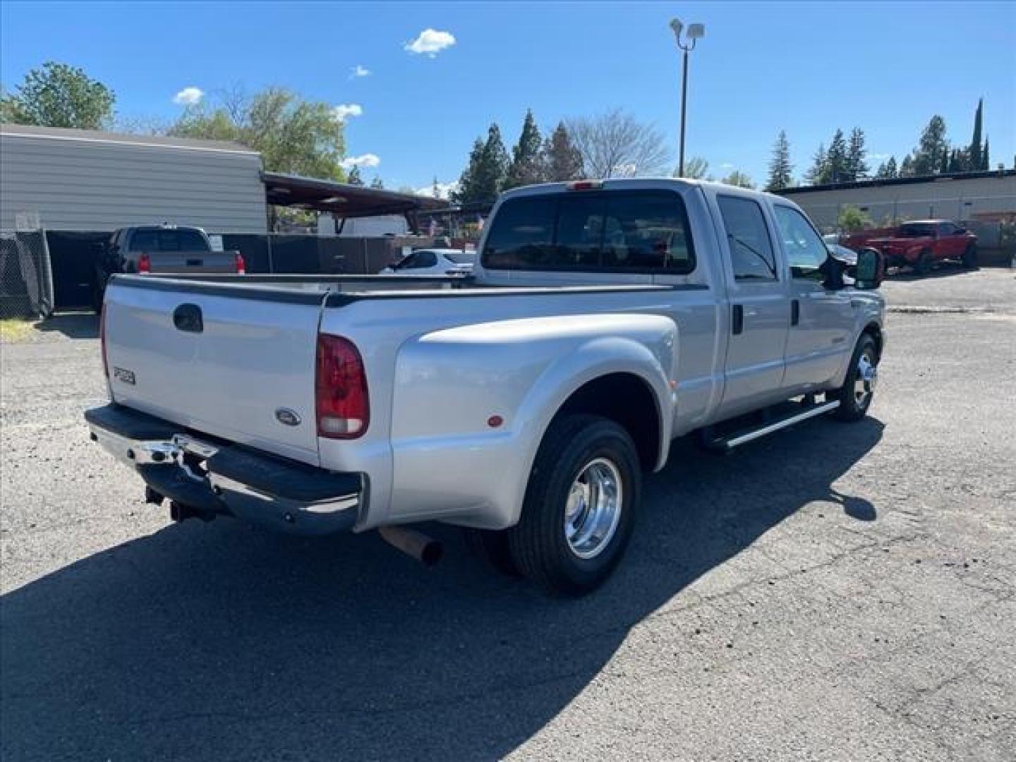2004 Silver Clearcoat Metallic Ford F-350 Super Duty XLT (1FTWW32P24E) with an Power Stroke 6.0L Diesel Turbo V8 325hp 560ft. lbs. Other engine, 5-Speed Automatic transmission, located at 800 Riverside Ave, Roseville, CA, 95678, 916-773-4549 & Toll Free: 866-719-4393, 38.732265, -121.291039 - DIESEL CREW CAB DUALLY XLT LOW MILES MOON ROOF NEW TIRES NEW HIGH PRESSURE OIL PUMP NEW EGR AND OIL COOLER AUXILIARY FUEL TANK - Photo#3