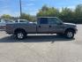2005 Dark Shadow Grey Clearcoat Metallic Ford F-250 Super Duty Lariat (1FTSW21P45E) with an 6.0L Power Stroke 6.0L Diesel Turbo V8 325hp 560ft. lbs. Direct Injection engine, 5-Speed Automatic transmission, located at 800 Riverside Ave, Roseville, CA, 95678, 916-773-4549 & Toll Free: 866-719-4393, 38.732265, -121.291039 - DIESEL CREW CAB 4X4 FX4 LARIAT HEADSTUDS SERVICE RECORDS- Photo#5