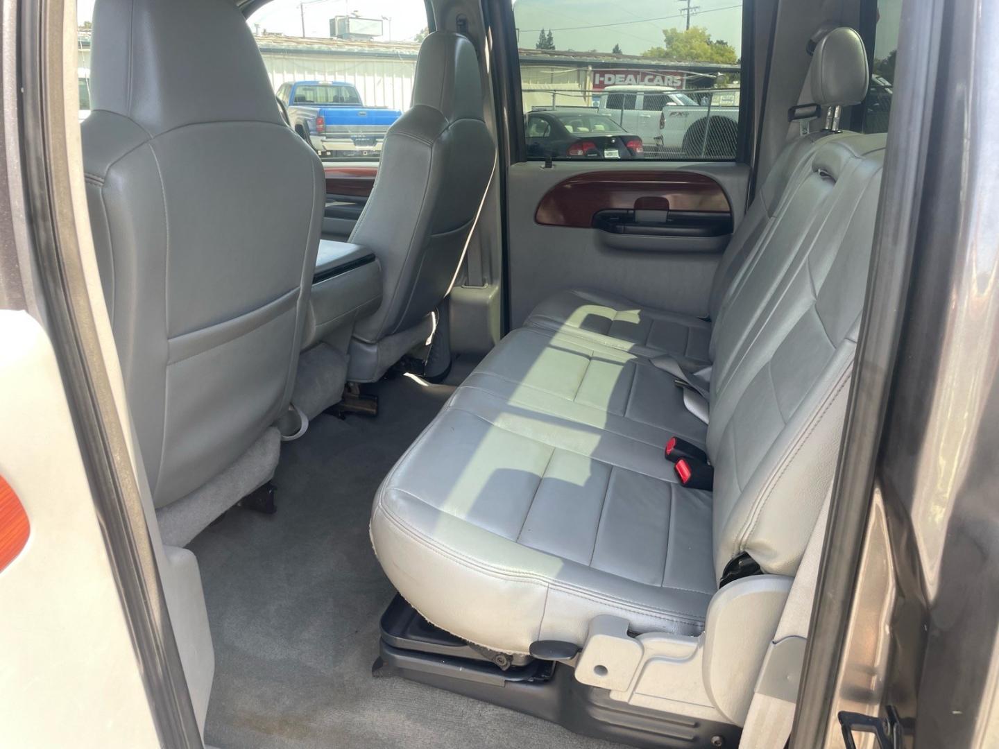 2005 Dark Shadow Grey Clearcoat Metallic Ford F-250 Super Duty Lariat (1FTSW21P45E) with an 6.0L Power Stroke 6.0L Diesel Turbo V8 325hp 560ft. lbs. Direct Injection engine, 5-Speed Automatic transmission, located at 800 Riverside Ave, Roseville, CA, 95678, 916-773-4549 & Toll Free: 866-719-4393, 38.732265, -121.291039 - DIESEL CREW CAB 4X4 FX4 LARIAT HEADSTUDS SERVICE RECORDS- Photo#10