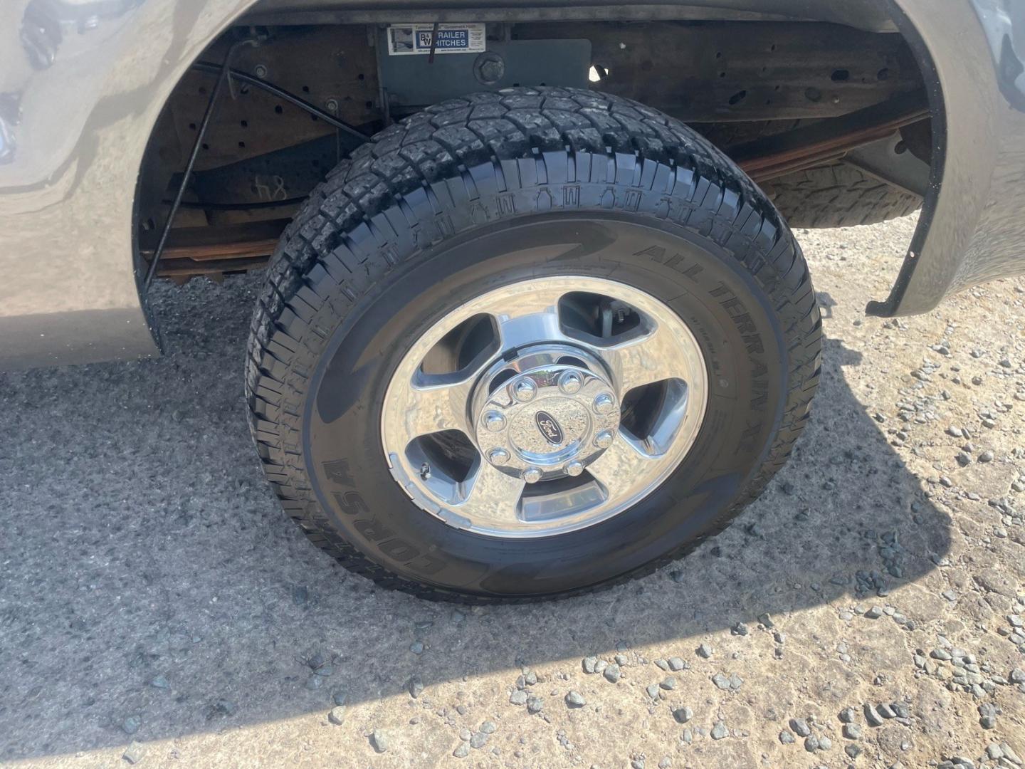 2005 Dark Shadow Grey Clearcoat Metallic Ford F-250 Super Duty Lariat (1FTSW21P45E) with an 6.0L Power Stroke 6.0L Diesel Turbo V8 325hp 560ft. lbs. Direct Injection engine, 5-Speed Automatic transmission, located at 800 Riverside Ave, Roseville, CA, 95678, 916-773-4549 & Toll Free: 866-719-4393, 38.732265, -121.291039 - DIESEL CREW CAB 4X4 FX4 LARIAT HEADSTUDS SERVICE RECORDS- Photo#13