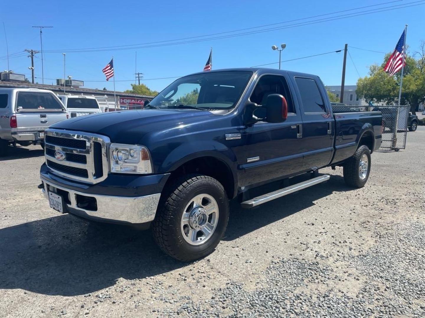 2005 True Blue Clearcoat Metallic Ford F-350 Super Duty Lariat (1FTWW31P25E) with an 6.0L Power Stroke 6.0L Diesel Turbo V8 325hp 560ft. lbs. Direct Injection engine, 5-Speed Automatic transmission, located at 800 Riverside Ave, Roseville, CA, 95678, 916-773-4549 & Toll Free: 866-719-4393, 38.732265, -121.291039 - DIESEL CREW CAB 4X4 LARIAT LOW MILES BULLET PROOF EGR AND OIL COOLER MOON ROOF CLEAN CARFAX - Photo#0