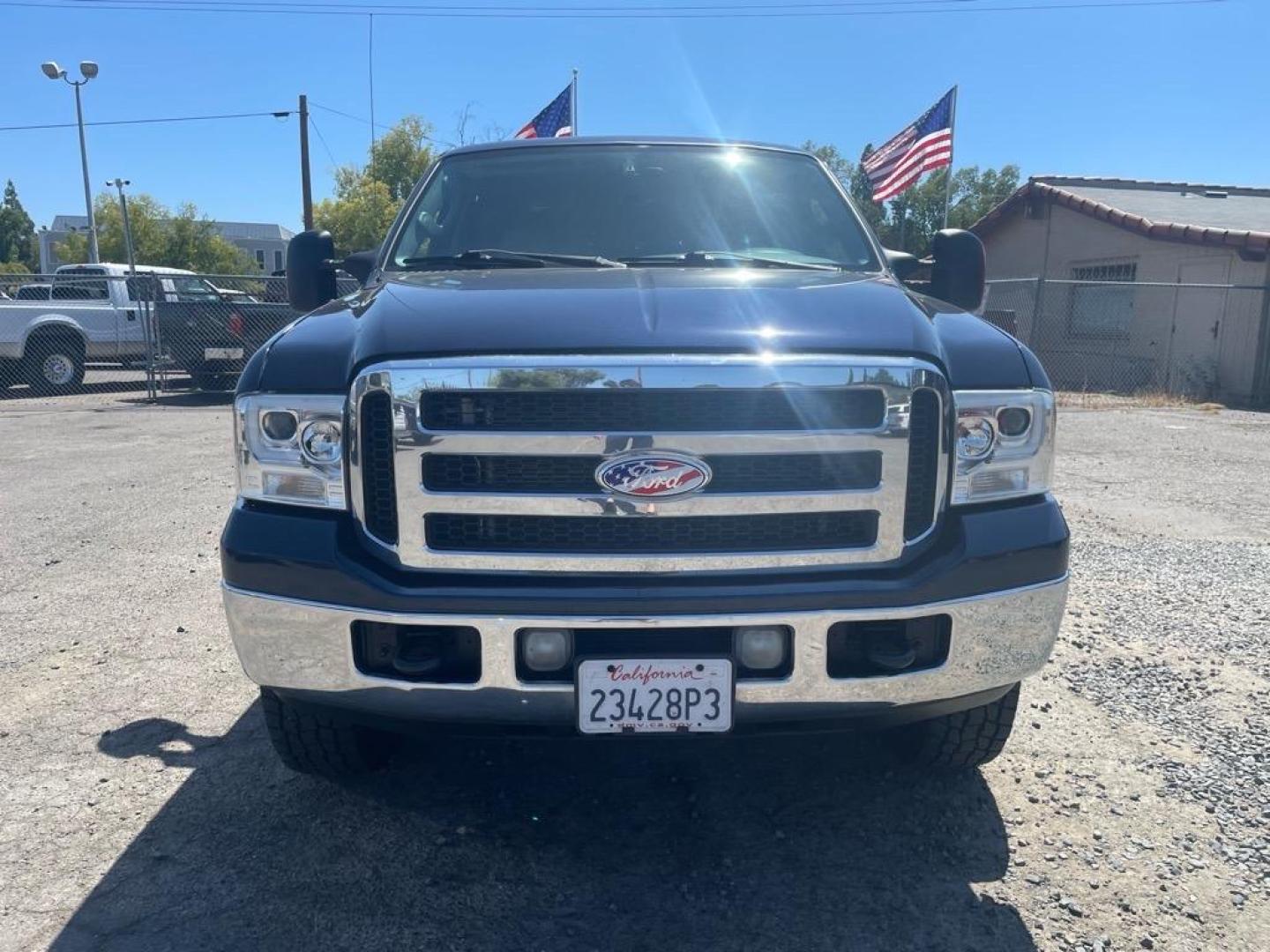 2005 True Blue Clearcoat Metallic Ford F-350 Super Duty Lariat (1FTWW31P25E) with an 6.0L Power Stroke 6.0L Diesel Turbo V8 325hp 560ft. lbs. Direct Injection engine, 5-Speed Automatic transmission, located at 800 Riverside Ave, Roseville, CA, 95678, 916-773-4549 & Toll Free: 866-719-4393, 38.732265, -121.291039 - DIESEL CREW CAB 4X4 LARIAT LOW MILES BULLET PROOF EGR AND OIL COOLER MOON ROOF CLEAN CARFAX - Photo#7
