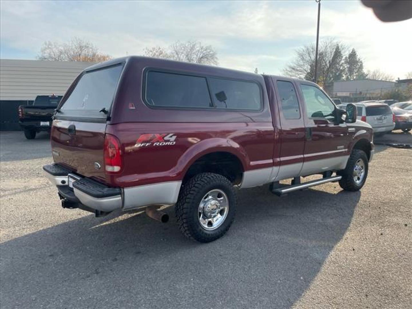 2005 Dark Toreador Red Clearcoat Ford F-250 Super Duty XLT (1FTSX21P85E) with an 6.0L Power Stroke 6.0L Diesel Turbo V8 325hp 560ft. lbs. Direct Injection engine, 5-Speed Automatic transmission, located at 800 Riverside Ave, Roseville, CA, 95678, 916-773-4549 & Toll Free: 866-719-4393, 38.732265, -121.291039 - DIESEL SUPER CAB 4X4 FX4 XLT HEADSTUDS NEW TIRES - Photo#2