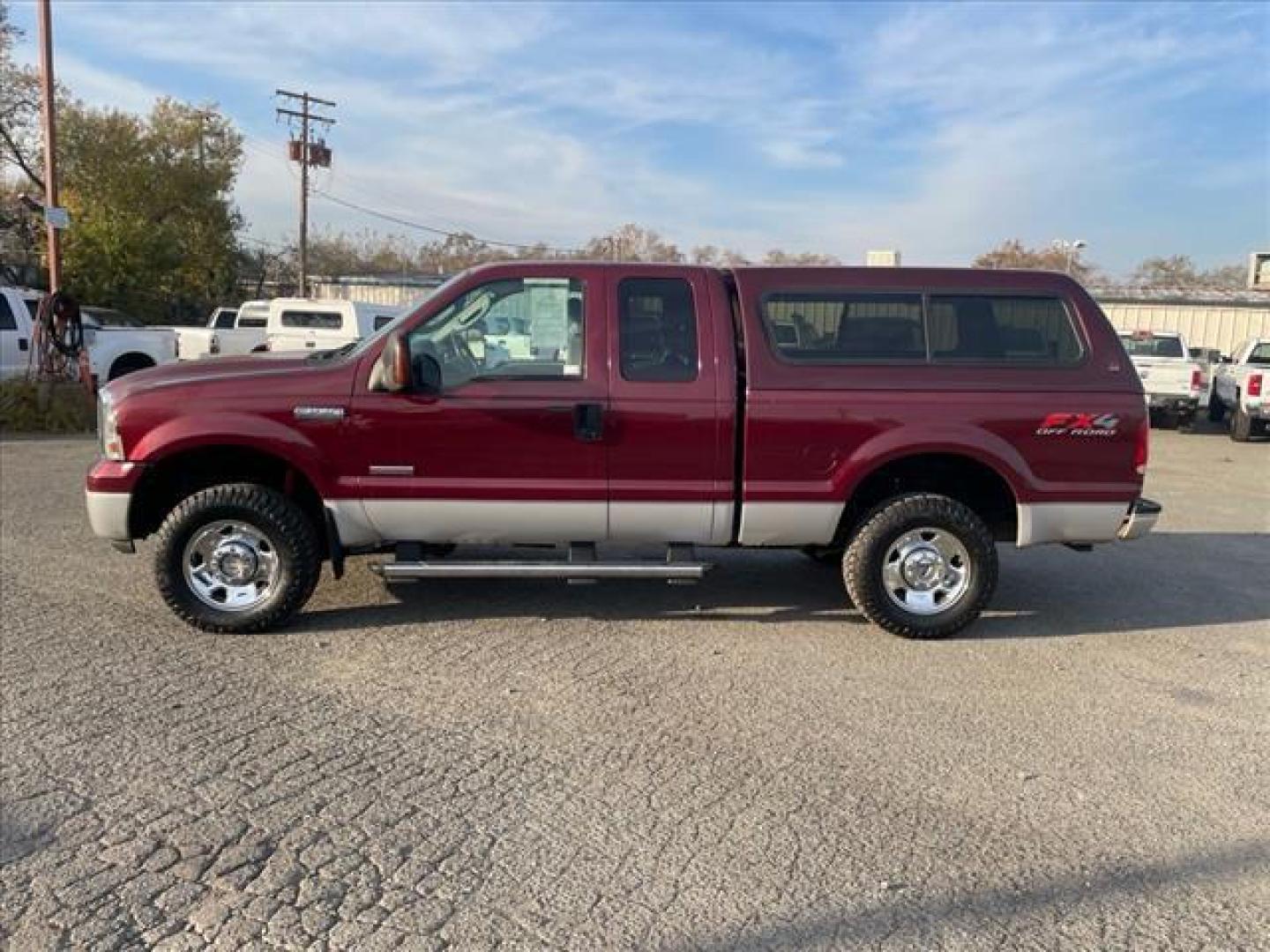 2005 Dark Toreador Red Clearcoat Ford F-250 Super Duty XLT (1FTSX21P85E) with an 6.0L Power Stroke 6.0L Diesel Turbo V8 325hp 560ft. lbs. Direct Injection engine, 5-Speed Automatic transmission, located at 800 Riverside Ave, Roseville, CA, 95678, 916-773-4549 & Toll Free: 866-719-4393, 38.732265, -121.291039 - DIESEL SUPER CAB 4X4 FX4 XLT HEADSTUDS NEW TIRES - Photo#3