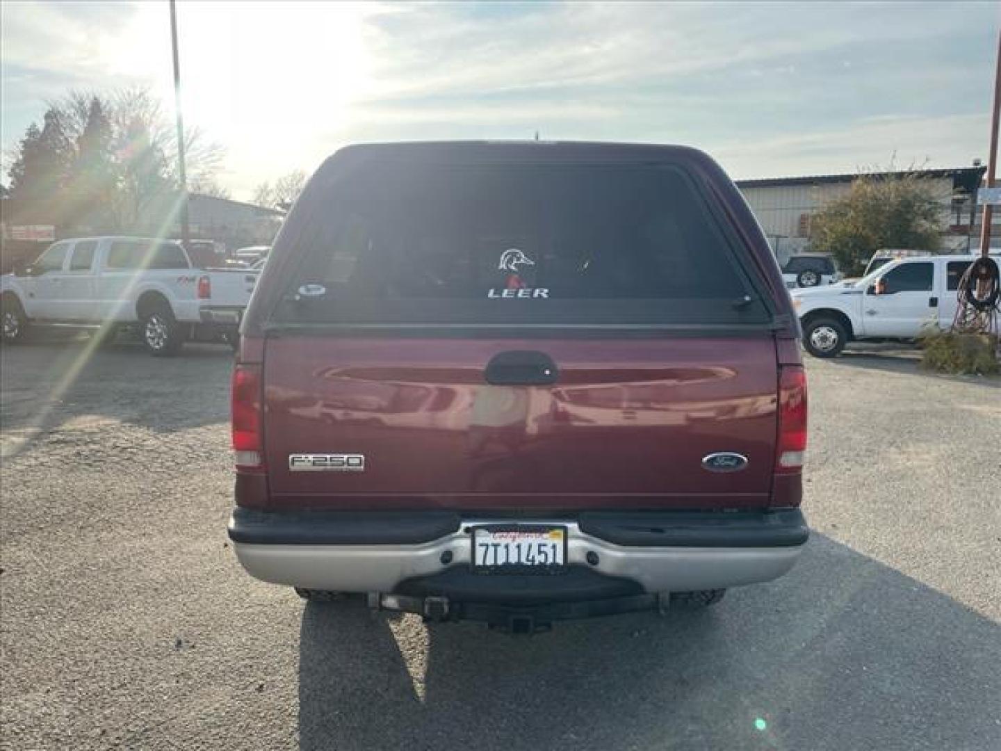 2005 Dark Toreador Red Clearcoat Ford F-250 Super Duty XLT (1FTSX21P85E) with an 6.0L Power Stroke 6.0L Diesel Turbo V8 325hp 560ft. lbs. Direct Injection engine, 5-Speed Automatic transmission, located at 800 Riverside Ave, Roseville, CA, 95678, 916-773-4549 & Toll Free: 866-719-4393, 38.732265, -121.291039 - DIESEL SUPER CAB 4X4 FX4 XLT HEADSTUDS NEW TIRES - Photo#5