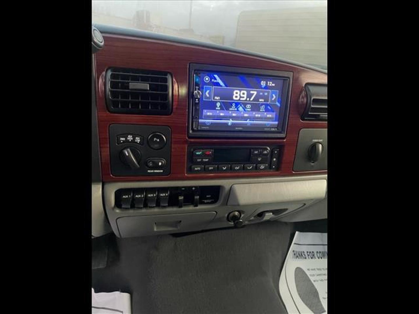 2005 Red Clearcoat Ford F-250 Super Duty Lariat (1FTSW21P05E) with an 6.0L Power Stroke 6.0L Diesel Turbo V8 325hp 560ft. lbs. Direct Injection engine, 5-Speed Automatic transmission, located at 800 Riverside Ave, Roseville, CA, 95678, 916-773-4549 & Toll Free: 866-719-4393, 38.732265, -121.291039 - DIESEL CREW CAB 4X4 BULLET PROOF EGR COOLER HEADSTUDS NEW TIRES LIFTED - Photo#10