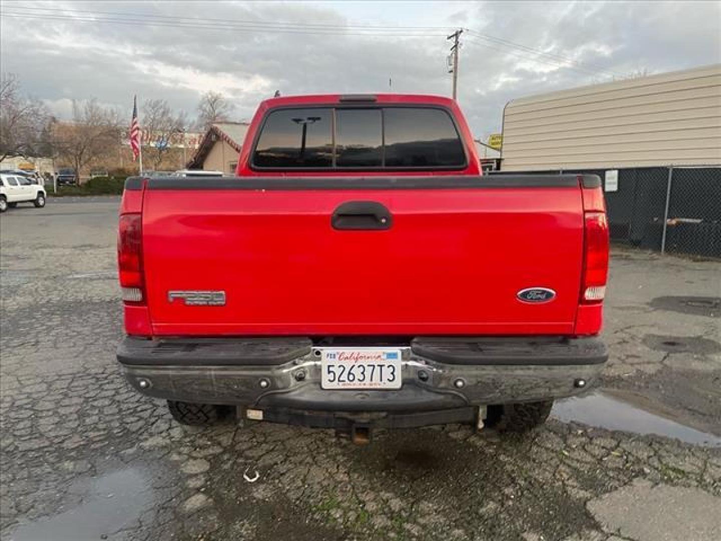 2005 Red Clearcoat Ford F-250 Super Duty Lariat (1FTSW21P05E) with an 6.0L Power Stroke 6.0L Diesel Turbo V8 325hp 560ft. lbs. Direct Injection engine, 5-Speed Automatic transmission, located at 800 Riverside Ave, Roseville, CA, 95678, 916-773-4549 & Toll Free: 866-719-4393, 38.732265, -121.291039 - DIESEL CREW CAB 4X4 BULLET PROOF EGR COOLER HEADSTUDS NEW TIRES LIFTED - Photo#8