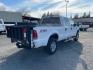 2005 Oxford White Clearcoat Ford F-250 Super Duty Lariat (1FTSW21P35E) with an 6.0L Power Stroke 6.0L Diesel Turbo V8 325hp 560ft. lbs. Direct Injection engine, 5-Speed Automatic transmission, located at 800 Riverside Ave, Roseville, CA, 95678, 916-773-4549 & Toll Free: 866-719-4393, 38.732265, -121.291039 - DIESEL CREW CAB 4X4 FX4 LARIAT LIFTGATE WINCH - Photo#3
