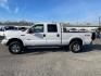 2005 Oxford White Clearcoat Ford F-250 Super Duty Lariat (1FTSW21P35E) with an 6.0L Power Stroke 6.0L Diesel Turbo V8 325hp 560ft. lbs. Direct Injection engine, 5-Speed Automatic transmission, located at 800 Riverside Ave, Roseville, CA, 95678, 916-773-4549 & Toll Free: 866-719-4393, 38.732265, -121.291039 - DIESEL CREW CAB 4X4 FX4 LARIAT LIFTGATE WINCH - Photo#4