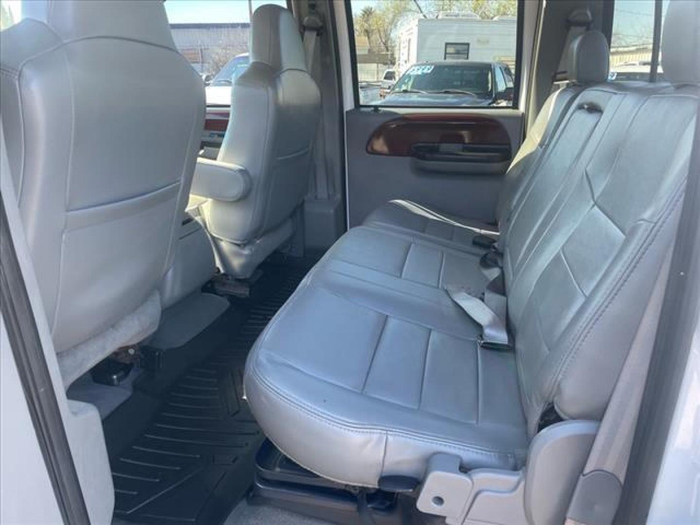 2005 Oxford White Clearcoat Ford F-250 Super Duty Lariat (1FTSW21PX5E) with an 6.0L Power Stroke 6.0L Diesel Turbo V8 325hp 560ft. lbs. Direct Injection engine, 5-Speed Automatic transmission, located at 800 Riverside Ave, Roseville, CA, 95678, 916-773-4549 & Toll Free: 866-719-4393, 38.732265, -121.291039 - DIESEL CREW CAB 4X4 FX4 LARIAT HEADSTUDS LIFTED AIR BAG SUSPENSION POWER RUNNING BOARDS CLEAN CARFAX - Photo#14