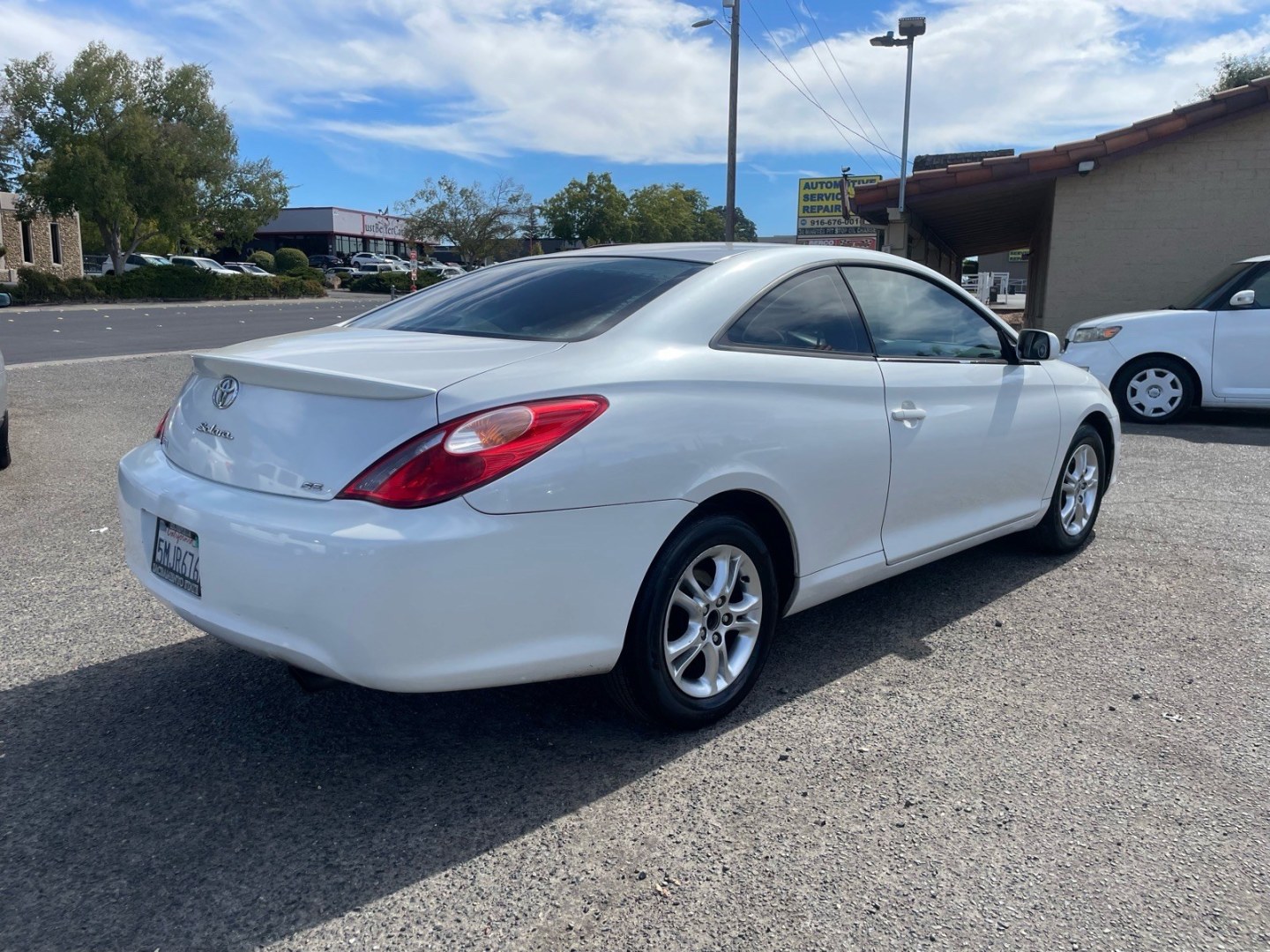 2005 White Toyota Camry Solara SE (4T1CE38P15U) with an 2.4L 2.4L I4 157hp 162ft. lbs. Other engine, 4-Speed Automatic transmission, located at 800 Riverside Ave, Roseville, CA, 95678, 916-773-4549 & Toll Free: 866-719-4393, 38.732265, -121.291039 - SE CLEAN CARFAX- Photo#3