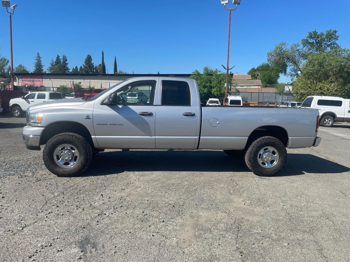 2006 Bright Silver Metallic Clearcoat Dodge Ram 2500 SLT (3D7KS28C56G) with an 5.9L 5.9L Turbocharged Diesel I6 OHV 24V FI Engine Direct Injection engine, 4-Speed Automatic transmission, located at 800 Riverside Ave, Roseville, CA, 95678, 916-773-4549 & Toll Free: 866-719-4393, 38.732265, -121.291039 - 5.9 CUMMINS DIESEL QUAD CAB 4X4 SLT LOW MILES- Photo#4