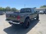 2006 Brown Ford F-250 Super Duty Lariat (1FTSW21P16E) with an 6.0L Power Stroke 6.0L Diesel Turbo V8 325hp 560ft. lbs. Direct Injection engine, 5-Speed Automatic transmission, located at 800 Riverside Ave, Roseville, CA, 95678, 916-773-4549 & Toll Free: 866-719-4393, 38.732265, -121.291039 - DIESEL CREW CAB 4X4 LARIAT LIFTED HEADSTUDS BULLET PROOF EGR COOLER SERVICE RECORDS - Photo#3