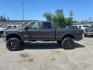 2006 Brown Ford F-250 Super Duty Lariat (1FTSW21P16E) with an 6.0L Power Stroke 6.0L Diesel Turbo V8 325hp 560ft. lbs. Direct Injection engine, 5-Speed Automatic transmission, located at 800 Riverside Ave, Roseville, CA, 95678, 916-773-4549 & Toll Free: 866-719-4393, 38.732265, -121.291039 - DIESEL CREW CAB 4X4 LARIAT LIFTED HEADSTUDS BULLET PROOF EGR COOLER SERVICE RECORDS - Photo#4