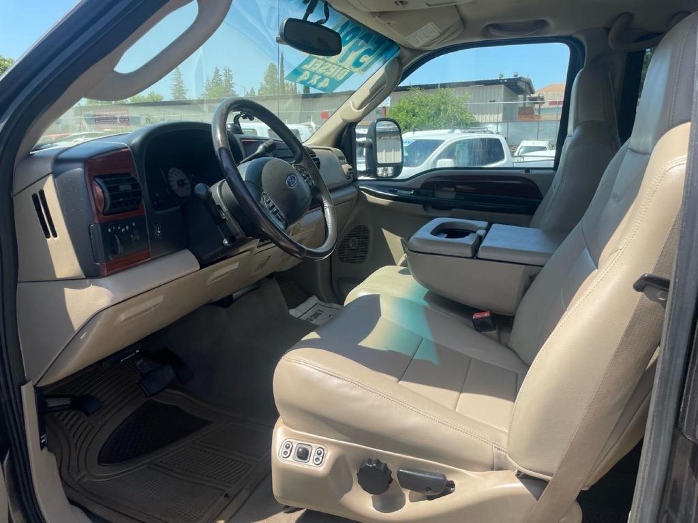 2006 Brown Ford F-250 Super Duty Lariat (1FTSW21P16E) with an 6.0L Power Stroke 6.0L Diesel Turbo V8 325hp 560ft. lbs. Direct Injection engine, 5-Speed Automatic transmission, located at 800 Riverside Ave, Roseville, CA, 95678, 916-773-4549 & Toll Free: 866-719-4393, 38.732265, -121.291039 - DIESEL CREW CAB 4X4 LARIAT LIFTED HEADSTUDS BULLET PROOF EGR COOLER SERVICE RECORDS - Photo#8