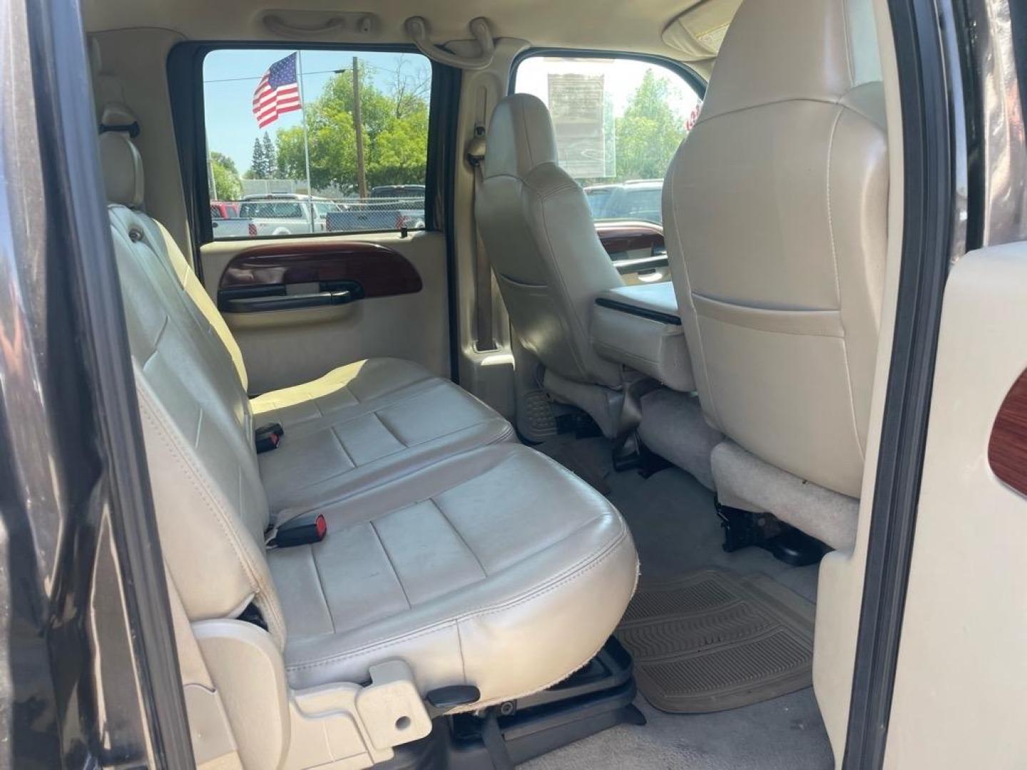 2006 Brown Ford F-250 Super Duty Lariat (1FTSW21P16E) with an 6.0L Power Stroke 6.0L Diesel Turbo V8 325hp 560ft. lbs. Direct Injection engine, 5-Speed Automatic transmission, located at 800 Riverside Ave, Roseville, CA, 95678, 916-773-4549 & Toll Free: 866-719-4393, 38.732265, -121.291039 - DIESEL CREW CAB 4X4 LARIAT LIFTED HEADSTUDS BULLET PROOF EGR COOLER SERVICE RECORDS - Photo#11