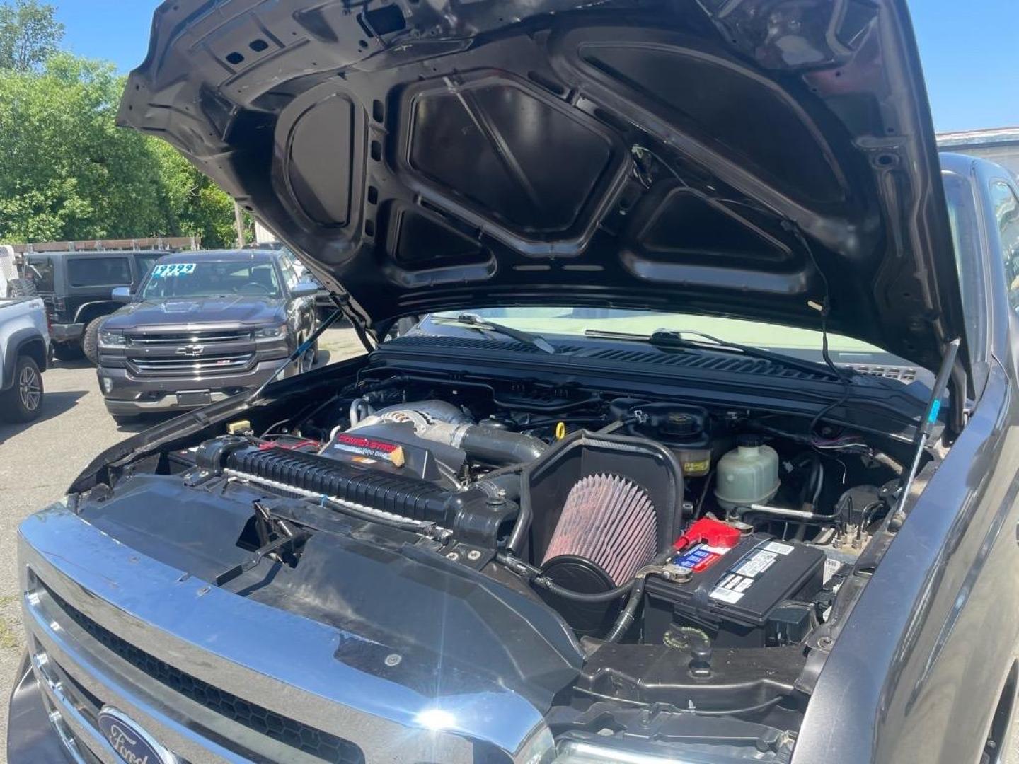 2006 Brown Ford F-250 Super Duty Lariat (1FTSW21P16E) with an 6.0L Power Stroke 6.0L Diesel Turbo V8 325hp 560ft. lbs. Direct Injection engine, 5-Speed Automatic transmission, located at 800 Riverside Ave, Roseville, CA, 95678, 916-773-4549 & Toll Free: 866-719-4393, 38.732265, -121.291039 - DIESEL CREW CAB 4X4 LARIAT LIFTED HEADSTUDS BULLET PROOF EGR COOLER SERVICE RECORDS - Photo#12