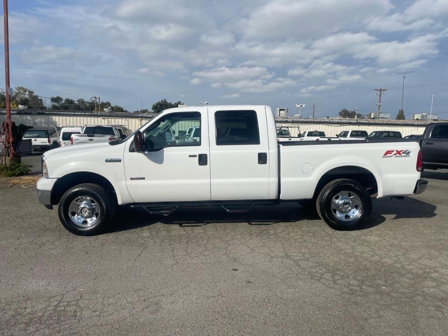 2006 Oxford White Clearcoat Ford F-250 Super Duty XLT (1FTSW21P06E) with an 6.0L Power Stroke 6.0L Diesel Turbo V8 325hp 560ft. lbs. Direct Injection engine, 5-Speed Automatic transmission, located at 800 Riverside Ave, Roseville, CA, 95678, 916-773-4549 & Toll Free: 866-719-4393, 38.732265, -121.291039 - DIESEL CREW CAB 4X4 FX4 XLT 95K MILES - Photo#1