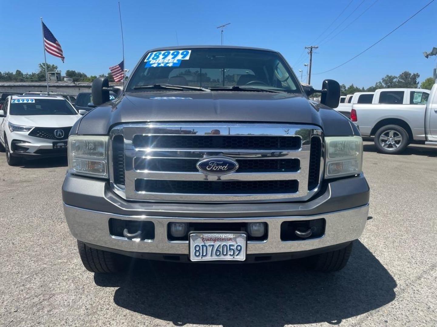 2006 Dark Shadow Grey Clearcoat Metallic Ford F-350 Super Duty Lariat (1FTWW31P26E) with an 6.0L Power Stroke 6.0L Diesel Turbo V8 325hp 560ft. lbs. Direct Injection engine, 5-Speed Automatic transmission, located at 800 Riverside Ave, Roseville, CA, 95678, 916-773-4549 & Toll Free: 866-719-4393, 38.732265, -121.291039 - DIESEL CREW CAB 4X4 LARIAT HEADSTUDS MOON ROOF - Photo#7