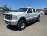 2006 Oxford White Clearcoat/Silver Clearcoat Metallic Ford F-350 Super Duty Lariat (1FTWW31PX6E) with an 6.0L Power Stroke 6.0L Diesel Turbo V8 325hp 560ft. lbs. Direct Injection engine, 5-Speed Automatic transmission, located at 800 Riverside Ave, Roseville, CA, 95678, 916-773-4549 & Toll Free: 866-719-4393, 38.732265, -121.291039 - DIESEL CREW CAB 4X4 LARIAT LIFTED - Photo#0