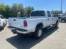 2006 Oxford White Clearcoat/Silver Clearcoat Metallic Ford F-350 Super Duty Lariat (1FTWW31PX6E) with an 6.0L Power Stroke 6.0L Diesel Turbo V8 325hp 560ft. lbs. Direct Injection engine, 5-Speed Automatic transmission, located at 800 Riverside Ave, Roseville, CA, 95678, 916-773-4549 & Toll Free: 866-719-4393, 38.732265, -121.291039 - DIESEL CREW CAB 4X4 LARIAT LIFTED - Photo#3