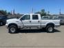 2006 Oxford White Clearcoat/Silver Clearcoat Metallic Ford F-350 Super Duty Lariat (1FTWW31PX6E) with an 6.0L Power Stroke 6.0L Diesel Turbo V8 325hp 560ft. lbs. Direct Injection engine, 5-Speed Automatic transmission, located at 800 Riverside Ave, Roseville, CA, 95678, 916-773-4549 & Toll Free: 866-719-4393, 38.732265, -121.291039 - DIESEL CREW CAB 4X4 LARIAT LIFTED - Photo#4