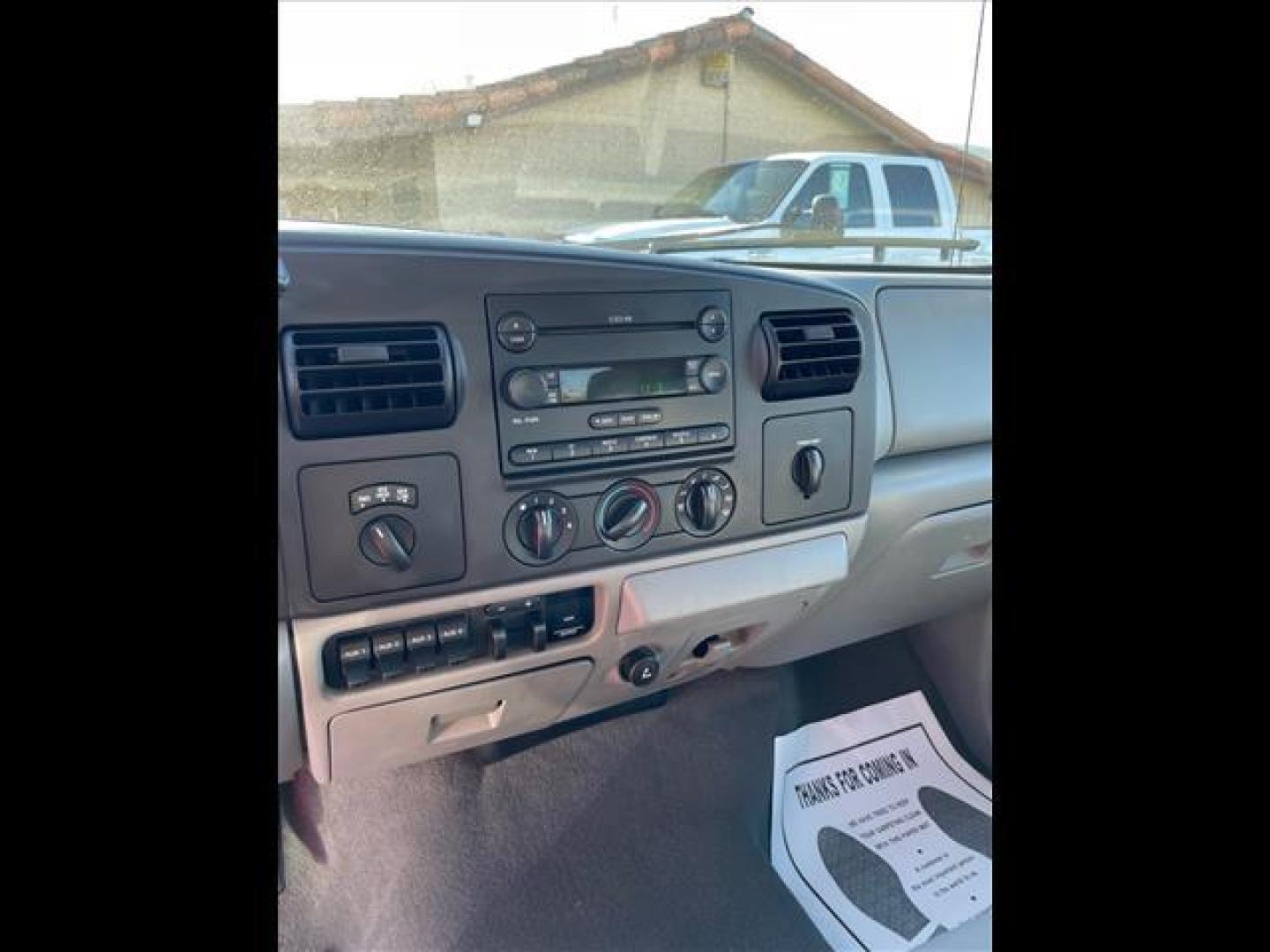 2006 Oxford White Clearcoat Ford F-250 Super Duty XLT (1FTSW21P96E) with an 6.0L Power Stroke 6.0L Diesel Turbo V8 325hp 560ft. lbs. Direct Injection engine, 5-Speed Automatic transmission, located at 800 Riverside Ave, Roseville, CA, 95678, 916-773-4549 & Toll Free: 866-719-4393, 38.732265, -121.291039 - DIESEL CREW CAB 4X4 FX4 XLT HEADSTUDS BULLET PROOF EGR COOLER CLEAN CARFAX - Photo#10