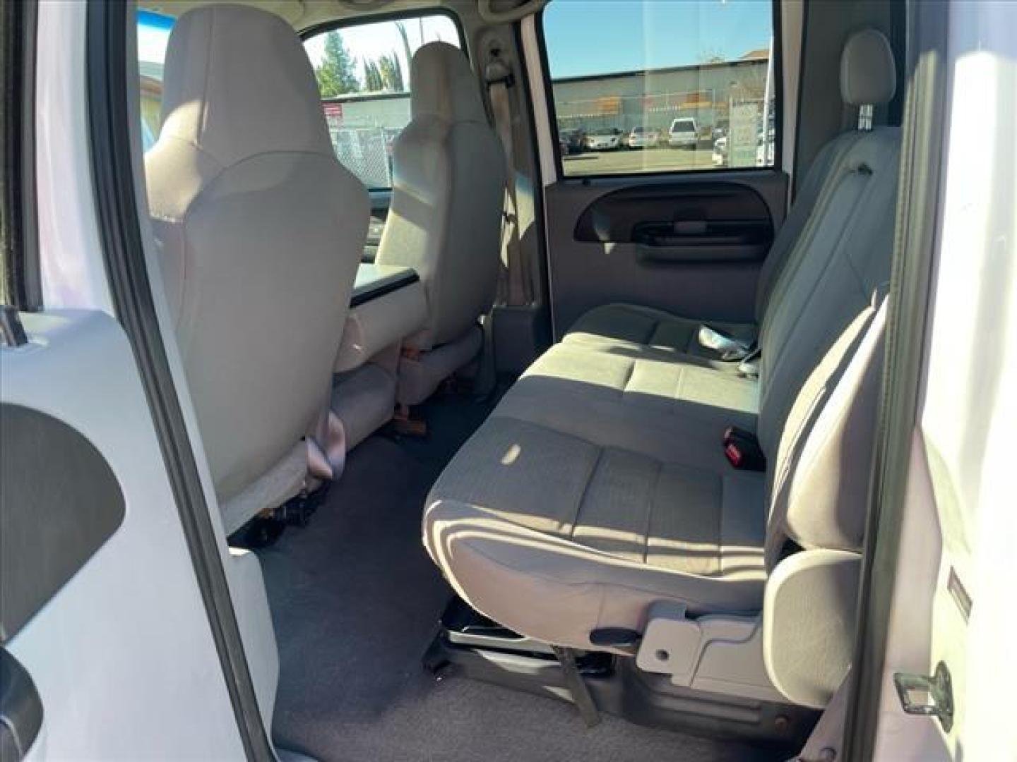 2006 Oxford White Clearcoat Ford F-250 Super Duty XLT (1FTSW21P96E) with an 6.0L Power Stroke 6.0L Diesel Turbo V8 325hp 560ft. lbs. Direct Injection engine, 5-Speed Automatic transmission, located at 800 Riverside Ave, Roseville, CA, 95678, 916-773-4549 & Toll Free: 866-719-4393, 38.732265, -121.291039 - DIESEL CREW CAB 4X4 FX4 XLT HEADSTUDS BULLET PROOF EGR COOLER CLEAN CARFAX - Photo#12