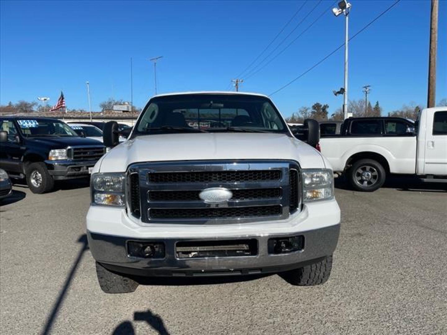 2006 Oxford White Clearcoat Ford F-250 Super Duty XLT (1FTSW21P96E) with an 6.0L Power Stroke 6.0L Diesel Turbo V8 325hp 560ft. lbs. Direct Injection engine, 5-Speed Automatic transmission, located at 800 Riverside Ave, Roseville, CA, 95678, 916-773-4549 & Toll Free: 866-719-4393, 38.732265, -121.291039 - DIESEL CREW CAB 4X4 FX4 XLT HEADSTUDS BULLET PROOF EGR COOLER CLEAN CARFAX - Photo#7