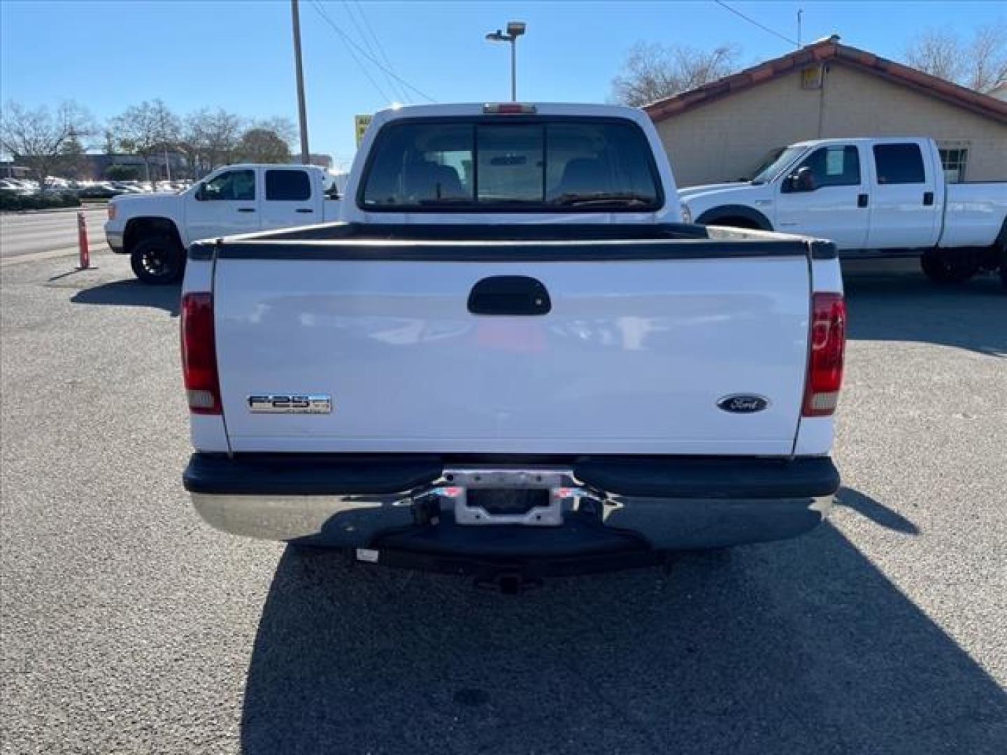 2006 Oxford White Clearcoat Ford F-250 Super Duty XLT (1FTSW21P96E) with an 6.0L Power Stroke 6.0L Diesel Turbo V8 325hp 560ft. lbs. Direct Injection engine, 5-Speed Automatic transmission, located at 800 Riverside Ave, Roseville, CA, 95678, 916-773-4549 & Toll Free: 866-719-4393, 38.732265, -121.291039 - DIESEL CREW CAB 4X4 FX4 XLT HEADSTUDS BULLET PROOF EGR COOLER CLEAN CARFAX - Photo#8