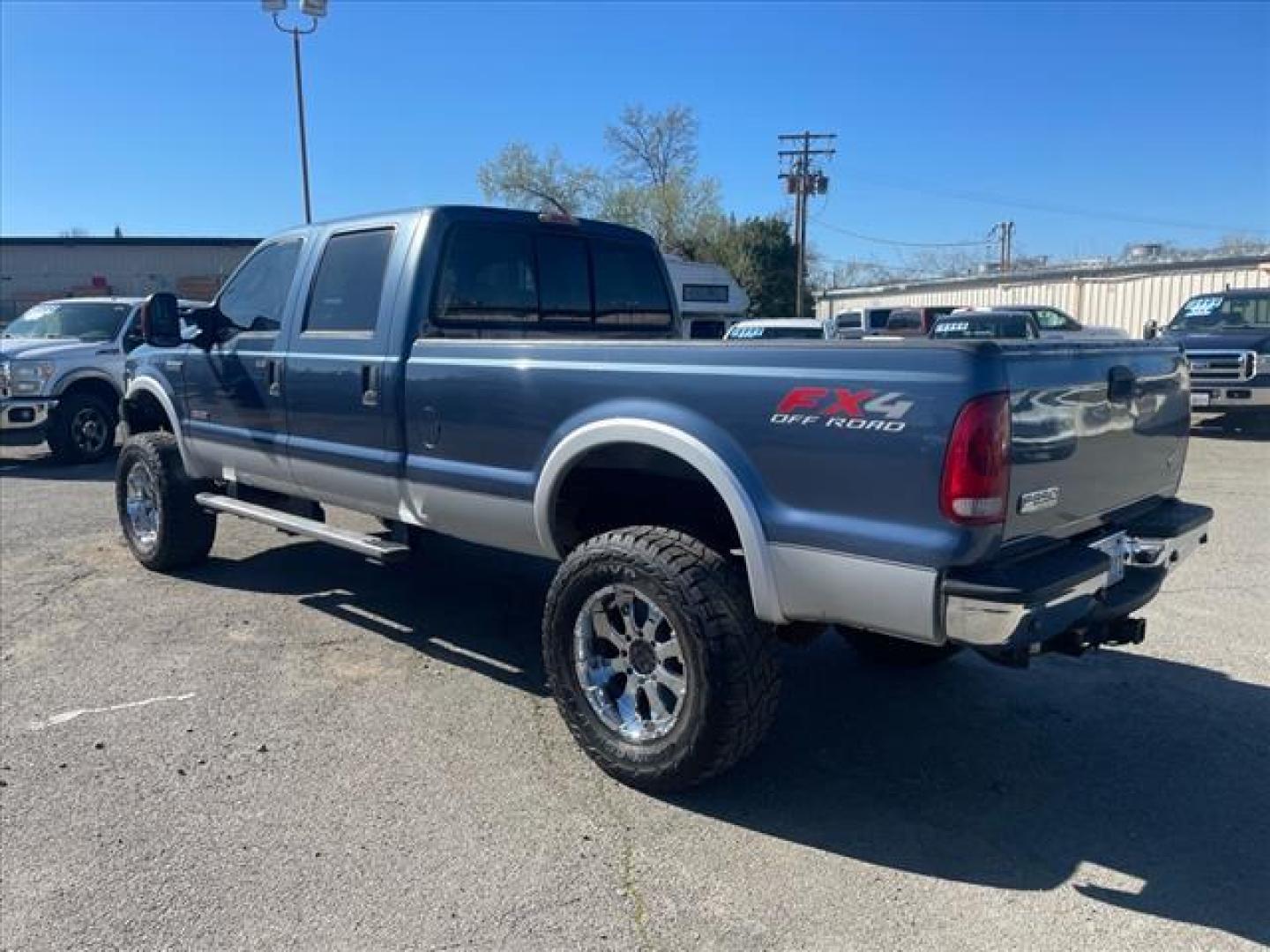 2006 Medium Wedgewood Blue Clearcoat Ford F-250 Super Duty Lariat (1FTSW21P36E) with an 6.0L Power Stroke 6.0L Diesel Turbo V8 325hp 560ft. lbs. Direct Injection engine, 5-Speed Automatic transmission, located at 800 Riverside Ave, Roseville, CA, 95678, 916-773-4549 & Toll Free: 866-719-4393, 38.732265, -121.291039 - DIESEL CREW CAB 4X4 FX4 LARIAT LIFTED SERVICE RECORDS ON CLEAN CARFAX - Photo#2