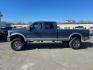 2006 Medium Wedgewood Blue Clearcoat Ford F-250 Super Duty Lariat (1FTSW21P36E) with an 6.0L Power Stroke 6.0L Diesel Turbo V8 325hp 560ft. lbs. Direct Injection engine, 5-Speed Automatic transmission, located at 800 Riverside Ave, Roseville, CA, 95678, 916-773-4549 & Toll Free: 866-719-4393, 38.732265, -121.291039 - DIESEL CREW CAB 4X4 FX4 LARIAT LIFTED SERVICE RECORDS ON CLEAN CARFAX - Photo#4