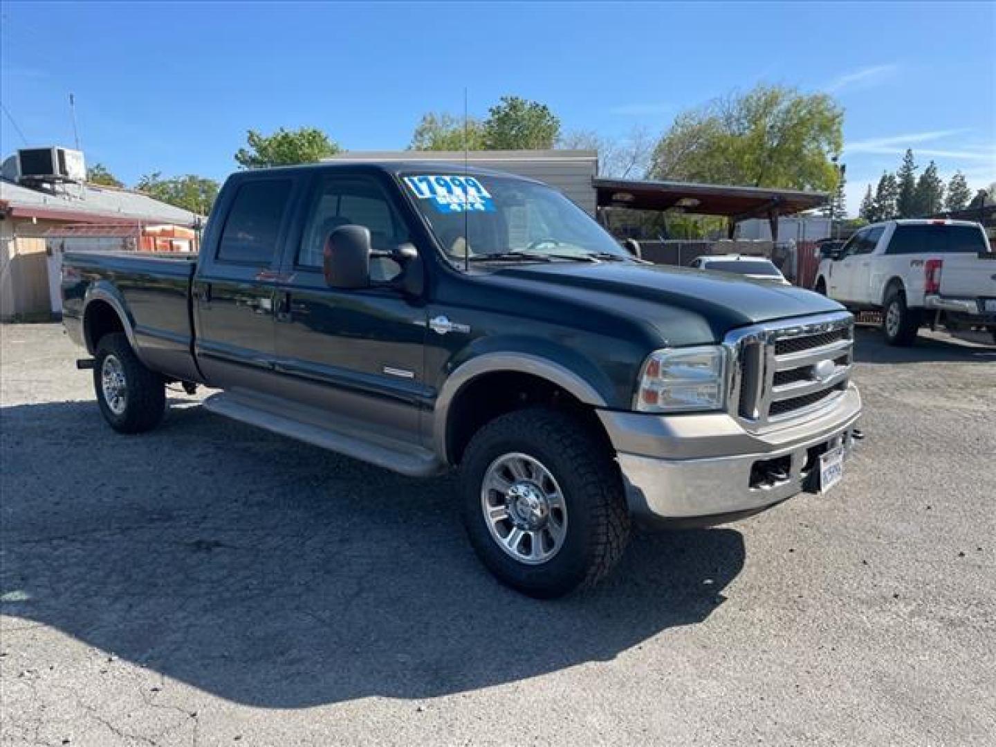 2006 Dark Green Satin Clearcoat Metallic Ford F-350 Super Duty King Ranch (1FTWW31P56E) with an 0.0 8 Cylinder Direct Injection engine, 5-Speed Automatic transmission, located at 800 Riverside Ave, Roseville, CA, 95678, 916-773-4549 & Toll Free: 866-719-4393, 38.732265, -121.291039 - DIESEL CREW CAB 4X4 FX4 KING RANCH LOW MILES - Photo#1