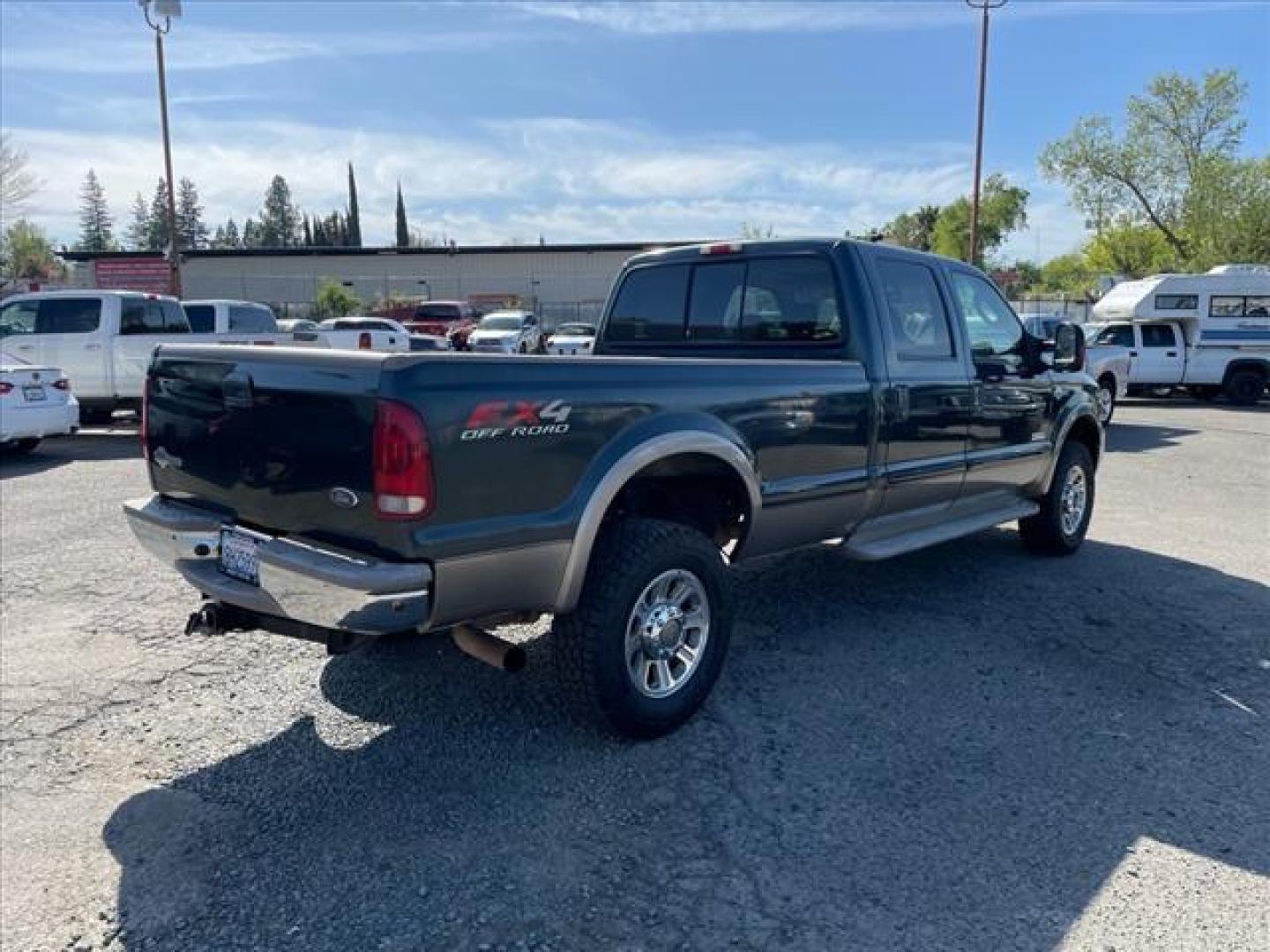 2006 Dark Green Satin Clearcoat Metallic Ford F-350 Super Duty King Ranch (1FTWW31P56E) with an 0.0 8 Cylinder Direct Injection engine, 5-Speed Automatic transmission, located at 800 Riverside Ave, Roseville, CA, 95678, 916-773-4549 & Toll Free: 866-719-4393, 38.732265, -121.291039 - DIESEL CREW CAB 4X4 FX4 KING RANCH LOW MILES - Photo#4