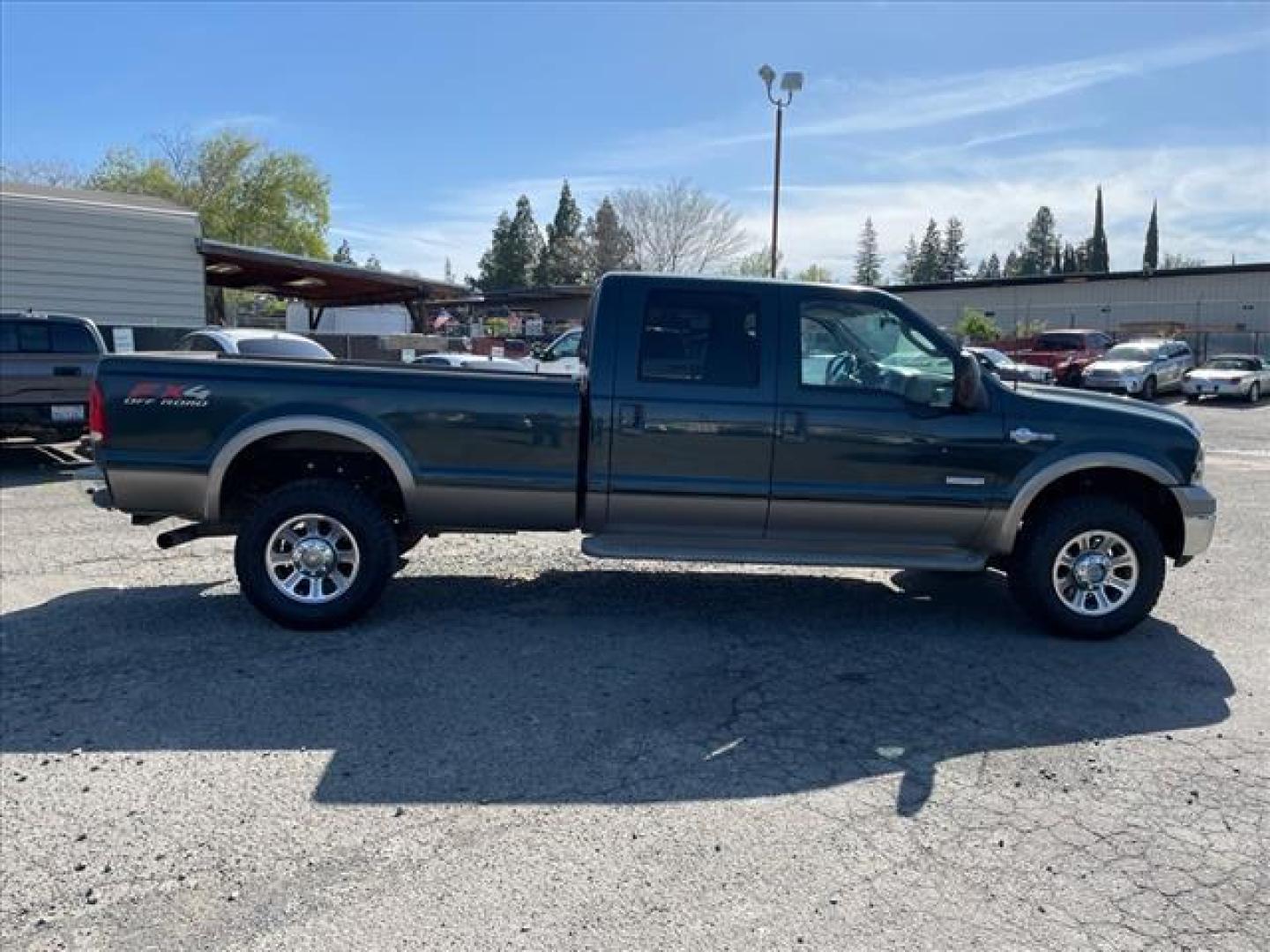 2006 Dark Green Satin Clearcoat Metallic Ford F-350 Super Duty King Ranch (1FTWW31P56E) with an 0.0 8 Cylinder Direct Injection engine, 5-Speed Automatic transmission, located at 800 Riverside Ave, Roseville, CA, 95678, 916-773-4549 & Toll Free: 866-719-4393, 38.732265, -121.291039 - DIESEL CREW CAB 4X4 FX4 KING RANCH LOW MILES - Photo#6