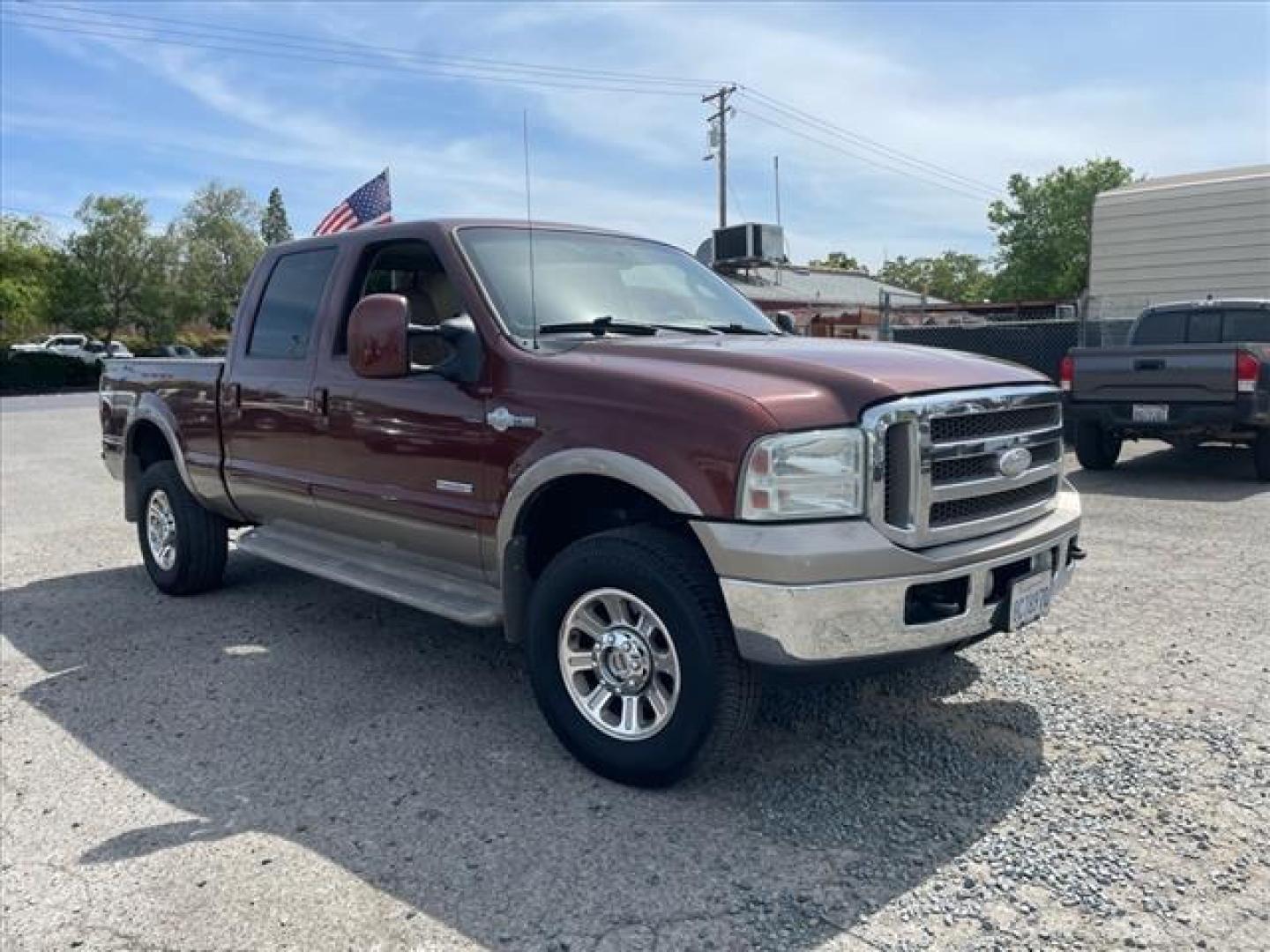 2006 Dark Toreador Red Clearcoat/Arizona Beige Clearcoa Ford F-350 Super Duty King Ranch (1FTWW31P26E) with an 0.0 8 Cylinder Direct Injection engine, 5-Speed Automatic transmission, located at 800 Riverside Ave, Roseville, CA, 95678, 916-773-4549 & Toll Free: 866-719-4393, 38.732265, -121.291039 - DIESEL CREW CAB 4X4 KING RANCH CLEAN CARFAX - Photo#1