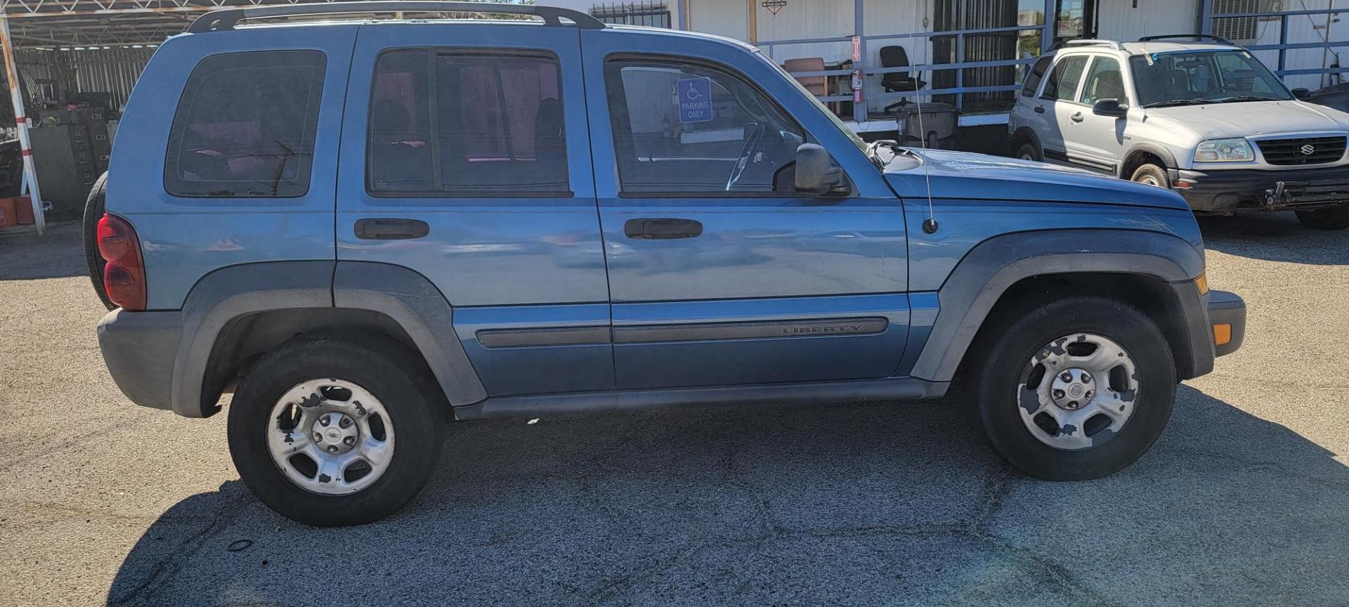 2006 Jeep Liberty Sport 2WD (1J4GK48K76W) with an 3.7L V6 SOHC 12V engine, AUTO transmission, located at 44356 Date Ave., Lancaster, CA, 93534, (661) 945-6555, 34.688919, -118.139374- Photo#1