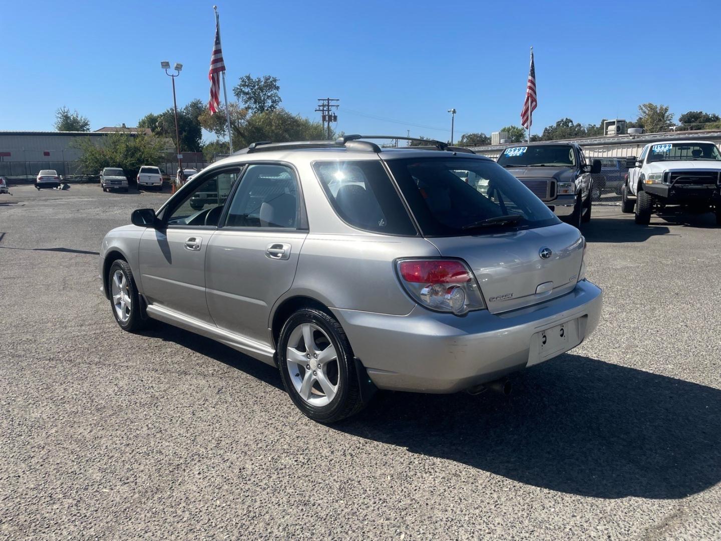 2006 Crystal Gray Metallic Subaru Impreza 2.5 i (JF1GG67626G) with an 2.5L 2L NA H4 single overhead cam (SOHC) 16V Other engine, 5-Speed Manual transmission, located at 800 Riverside Ave, Roseville, CA, 95678, 916-773-4549 & Toll Free: 866-719-4393, 38.732265, -121.291039 - AWD ONE OWNER CLEAN CARFAX- Photo#2