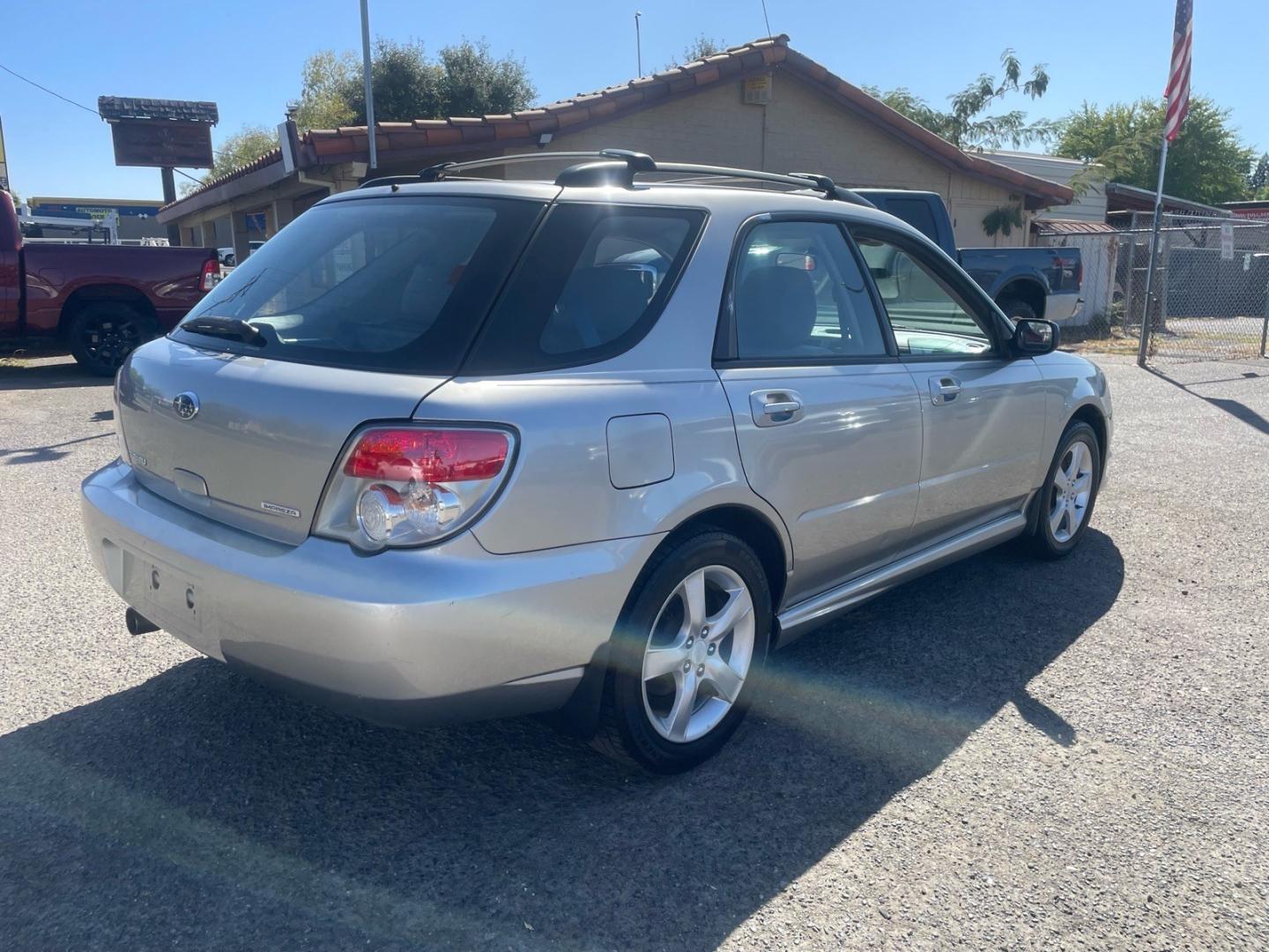 2006 Crystal Gray Metallic Subaru Impreza 2.5 i (JF1GG67626G) with an 2.5L 2L NA H4 single overhead cam (SOHC) 16V Other engine, 5-Speed Manual transmission, located at 800 Riverside Ave, Roseville, CA, 95678, 916-773-4549 & Toll Free: 866-719-4393, 38.732265, -121.291039 - AWD ONE OWNER CLEAN CARFAX- Photo#3