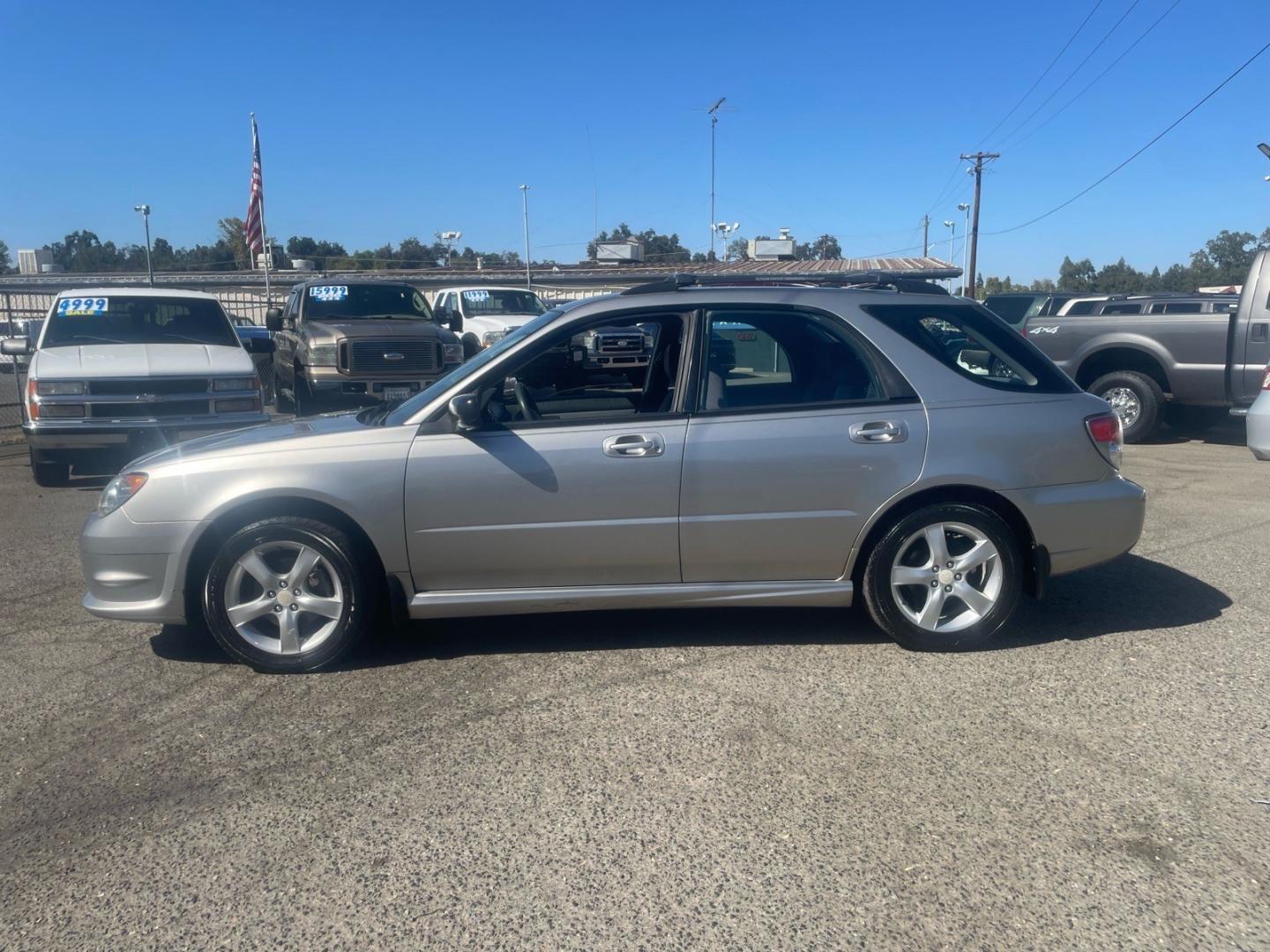 2006 Crystal Gray Metallic Subaru Impreza 2.5 i (JF1GG67626G) with an 2.5L 2L NA H4 single overhead cam (SOHC) 16V Other engine, 5-Speed Manual transmission, located at 800 Riverside Ave, Roseville, CA, 95678, 916-773-4549 & Toll Free: 866-719-4393, 38.732265, -121.291039 - AWD ONE OWNER CLEAN CARFAX- Photo#4