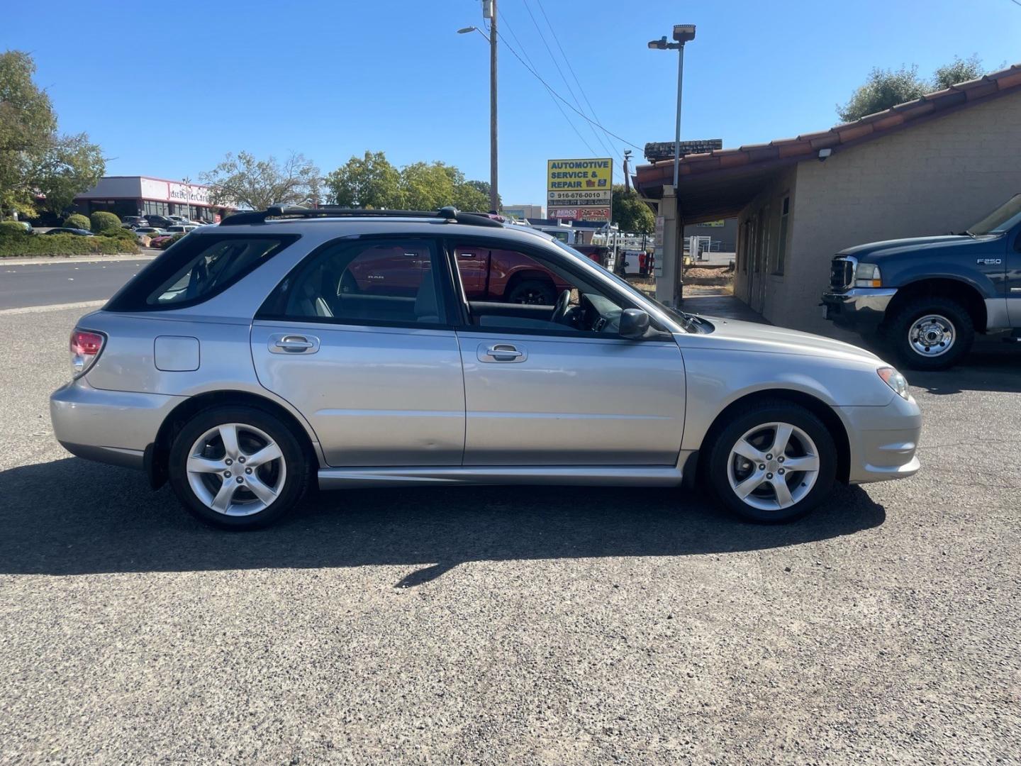 2006 Crystal Gray Metallic Subaru Impreza 2.5 i (JF1GG67626G) with an 2.5L 2L NA H4 single overhead cam (SOHC) 16V Other engine, 5-Speed Manual transmission, located at 800 Riverside Ave, Roseville, CA, 95678, 916-773-4549 & Toll Free: 866-719-4393, 38.732265, -121.291039 - AWD ONE OWNER CLEAN CARFAX- Photo#5