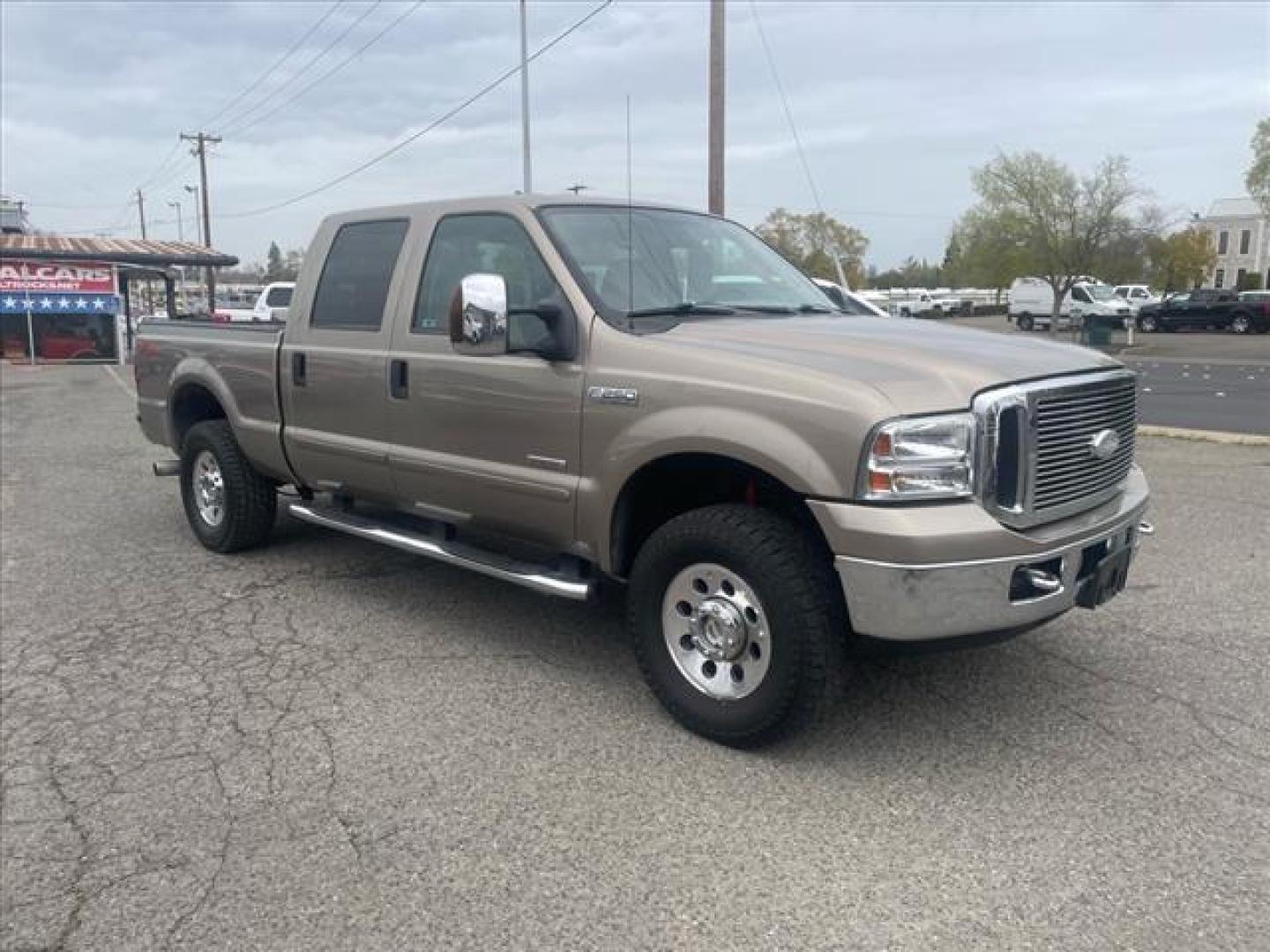 2007 Arizona Beige Clearcoat Metallic Ford F-250 Super Duty XLT (1FTSW21P97E) with an 6.0L 6.0L Turbo Diesel V8 OHV 32V Direct Injection engine, 5-Speed Automatic transmission, located at 800 Riverside Ave, Roseville, CA, 95678, 916-773-4549 & Toll Free: 866-719-4393, 38.732265, -121.291039 - DIESEL CREW CAB 4X4 FX4 XLT SERVICE RECORDS ON CLEAN CARFAX - Photo#1