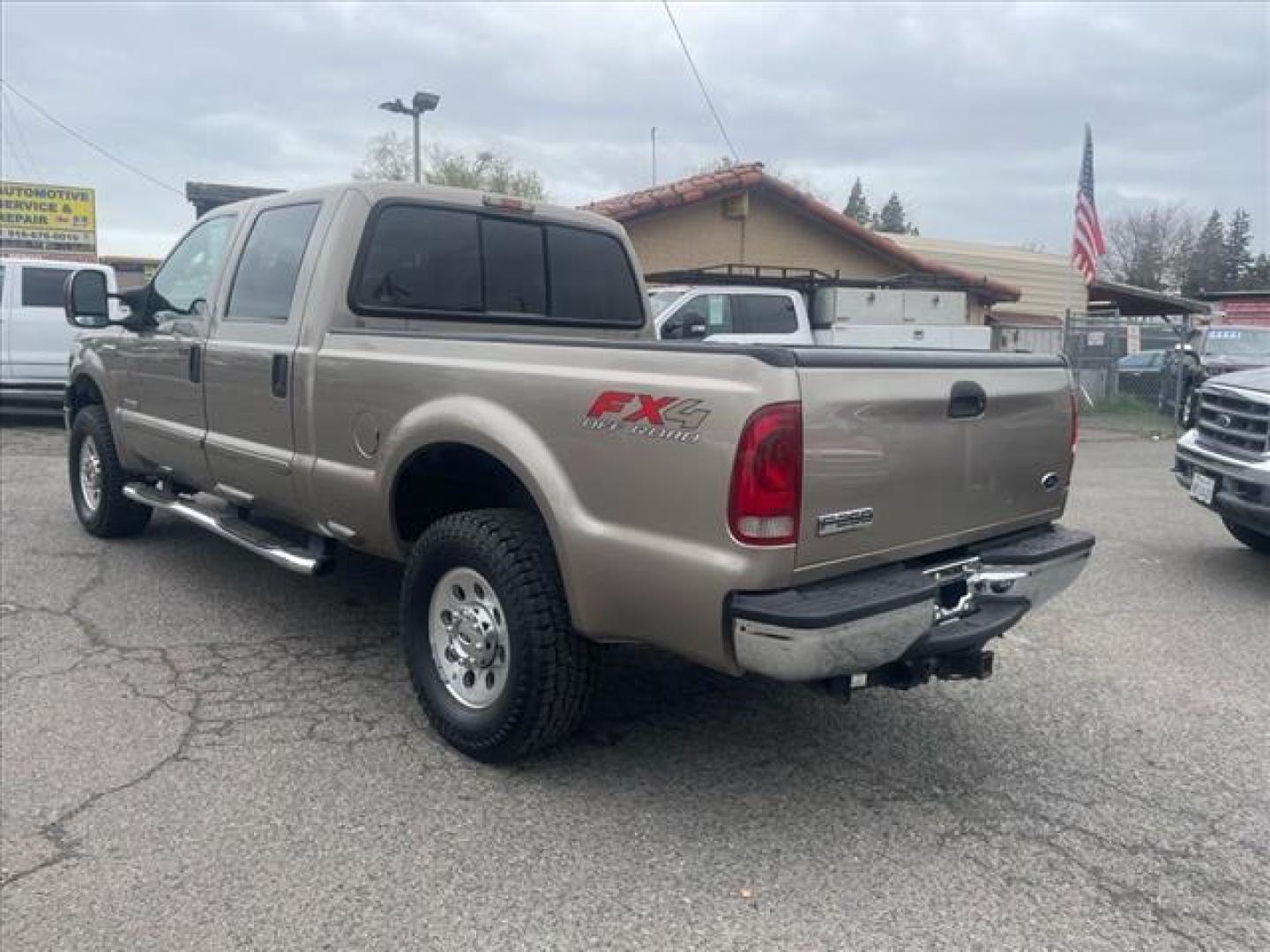2007 Arizona Beige Clearcoat Metallic Ford F-250 Super Duty XLT (1FTSW21P97E) with an 6.0L 6.0L Turbo Diesel V8 OHV 32V Direct Injection engine, 5-Speed Automatic transmission, located at 800 Riverside Ave, Roseville, CA, 95678, 916-773-4549 & Toll Free: 866-719-4393, 38.732265, -121.291039 - DIESEL CREW CAB 4X4 FX4 XLT SERVICE RECORDS ON CLEAN CARFAX - Photo#2