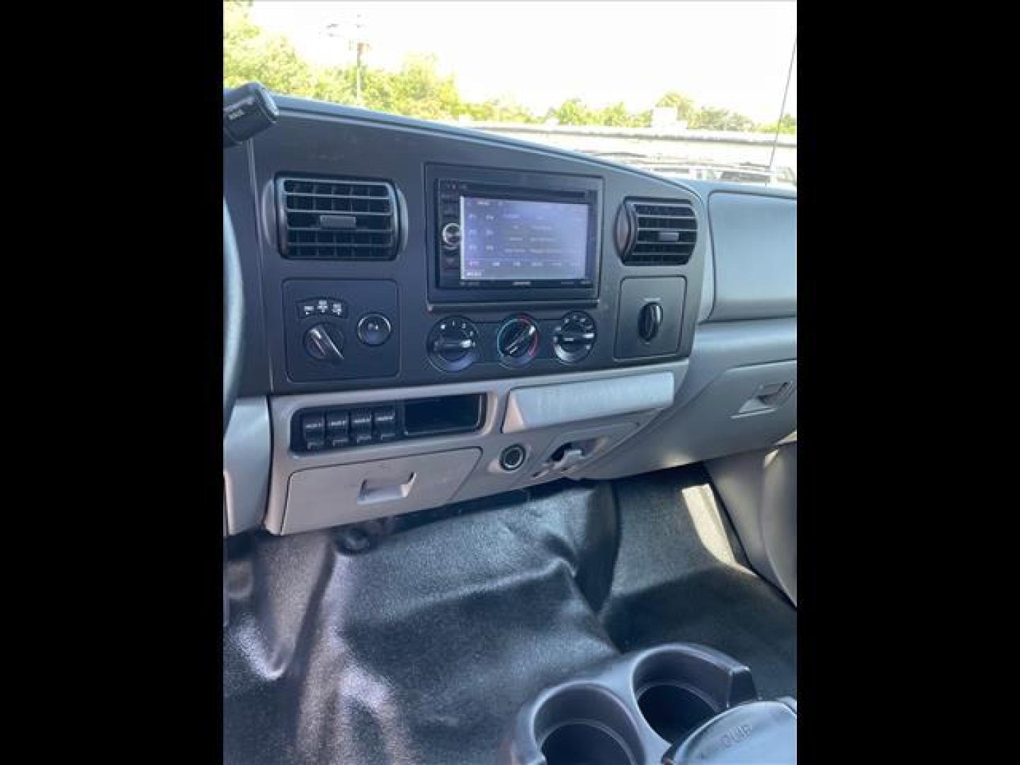 2007 Oxford White Clearcoat Ford F-350 Super Duty XLT (1FTWW31P77E) with an 6.0L 6.0L Turbo Diesel V8 OHV 32V Direct Injection engine, 5-Speed Automatic transmission, located at 800 Riverside Ave, Roseville, CA, 95678, 916-773-4549 & Toll Free: 866-719-4393, 38.732265, -121.291039 - DIESEL CREW CAB 4X4 XLT LIFTED NEW EGR COOLER AND OIL COOLER CLEAN CARFAX - Photo#10