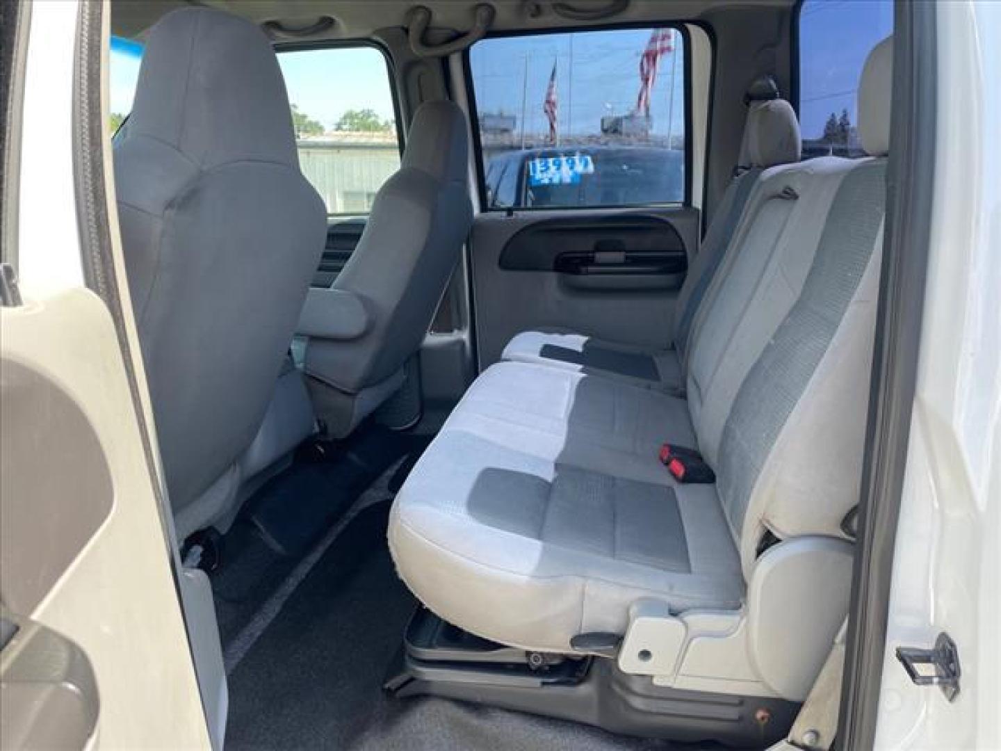 2007 Oxford White Clearcoat Ford F-350 Super Duty XLT (1FTWW31P77E) with an 6.0L 6.0L Turbo Diesel V8 OHV 32V Direct Injection engine, 5-Speed Automatic transmission, located at 800 Riverside Ave, Roseville, CA, 95678, 916-773-4549 & Toll Free: 866-719-4393, 38.732265, -121.291039 - DIESEL CREW CAB 4X4 XLT LIFTED NEW EGR COOLER AND OIL COOLER CLEAN CARFAX - Photo#12