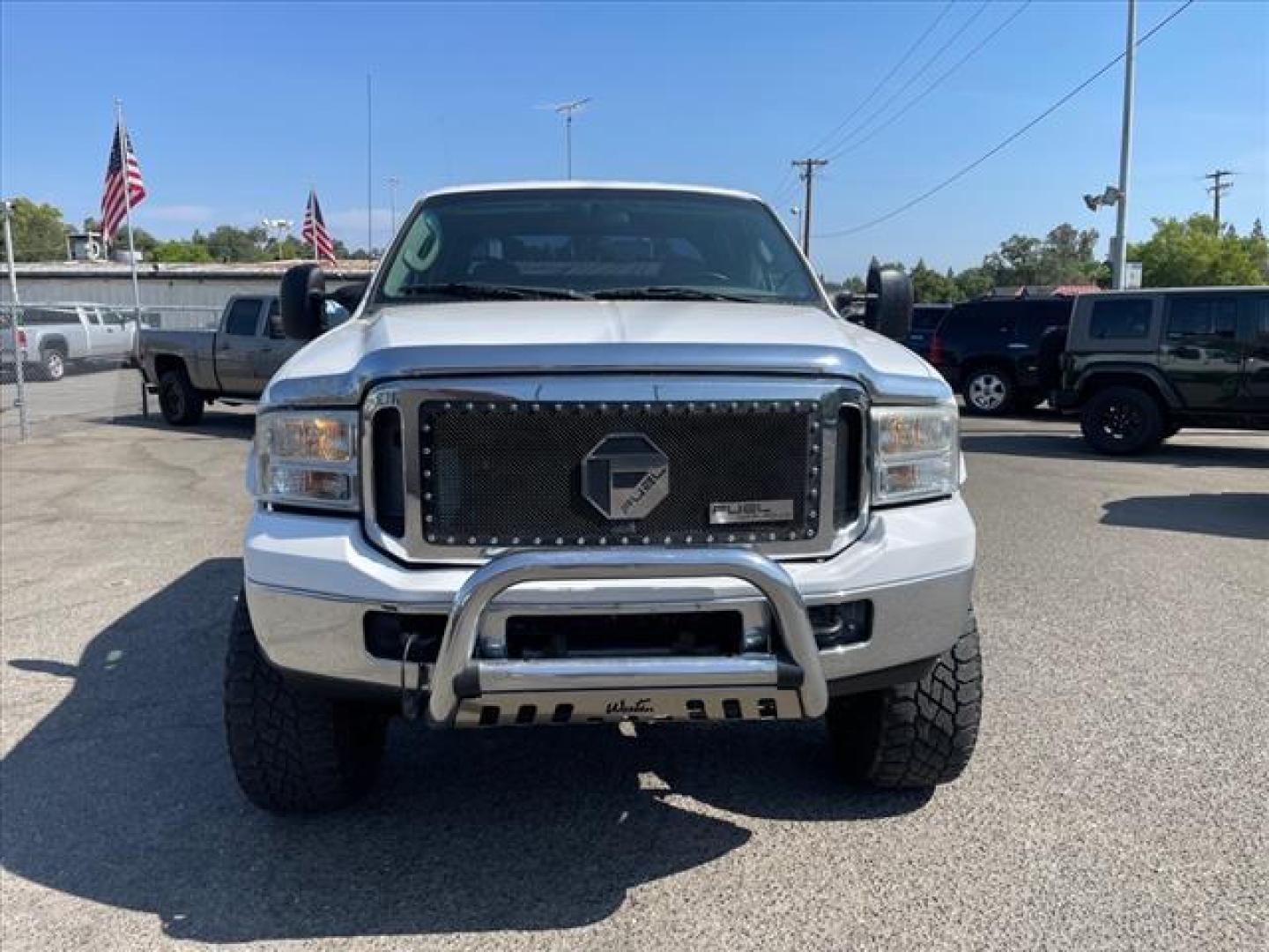 2007 Oxford White Clearcoat Ford F-350 Super Duty XLT (1FTWW31P77E) with an 6.0L 6.0L Turbo Diesel V8 OHV 32V Direct Injection engine, 5-Speed Automatic transmission, located at 800 Riverside Ave, Roseville, CA, 95678, 916-773-4549 & Toll Free: 866-719-4393, 38.732265, -121.291039 - DIESEL CREW CAB 4X4 XLT LIFTED NEW EGR COOLER AND OIL COOLER CLEAN CARFAX - Photo#7