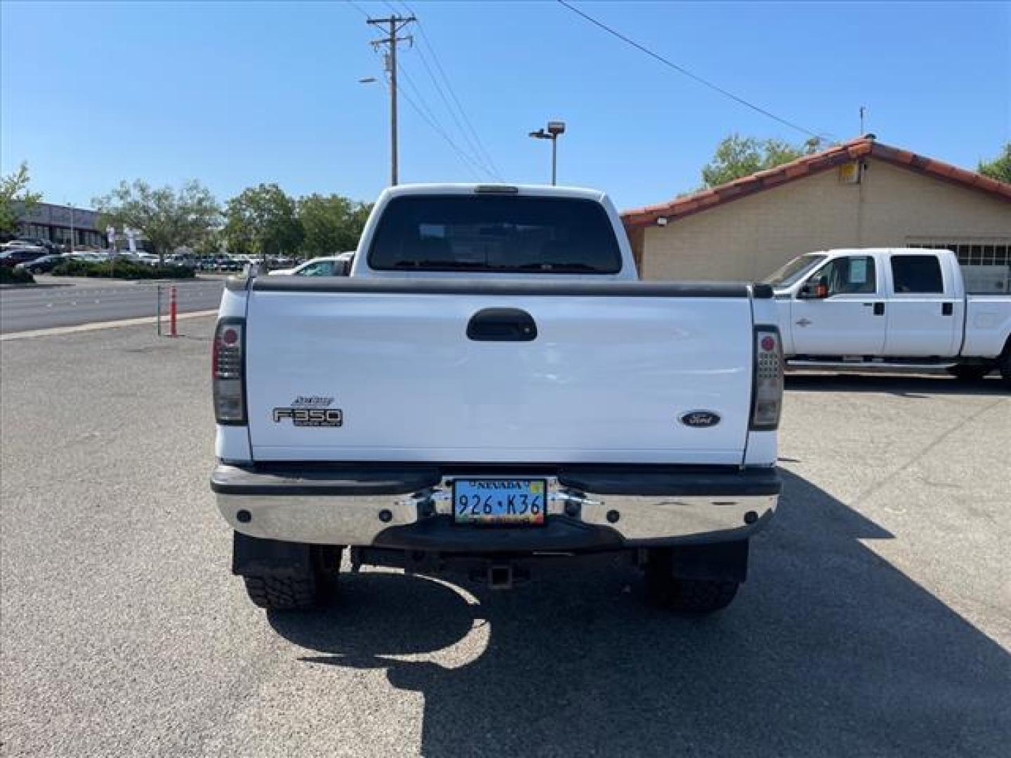 2007 Oxford White Clearcoat Ford F-350 Super Duty XLT (1FTWW31P77E) with an 6.0L 6.0L Turbo Diesel V8 OHV 32V Direct Injection engine, 5-Speed Automatic transmission, located at 800 Riverside Ave, Roseville, CA, 95678, 916-773-4549 & Toll Free: 866-719-4393, 38.732265, -121.291039 - DIESEL CREW CAB 4X4 XLT LIFTED NEW EGR COOLER AND OIL COOLER CLEAN CARFAX - Photo#8
