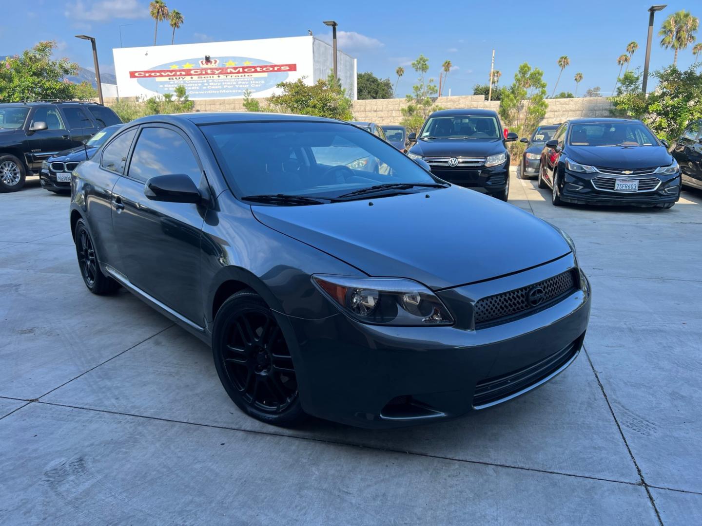 2008 Gray Metallic /Black Scion tC Sport Coupe (JTKDE167980) with an 2.4L L4 DOHC 16V engine, Automatic transmission, located at 30 S. Berkeley Avenue, Pasadena, CA, 91107, (626) 248-7567, 34.145447, -118.109398 - Discover Your Ideal Pre-Owned Vehicle at Crown City Motors in Pasadena, CA Are you in the market for a reliable used car or truck? Look no further than Crown City Motors, your trusted used car dealer located at 30 S Berkeley Ave, Pasadena, CA 91107. We take pride in offering a wide selection of h - Photo#4